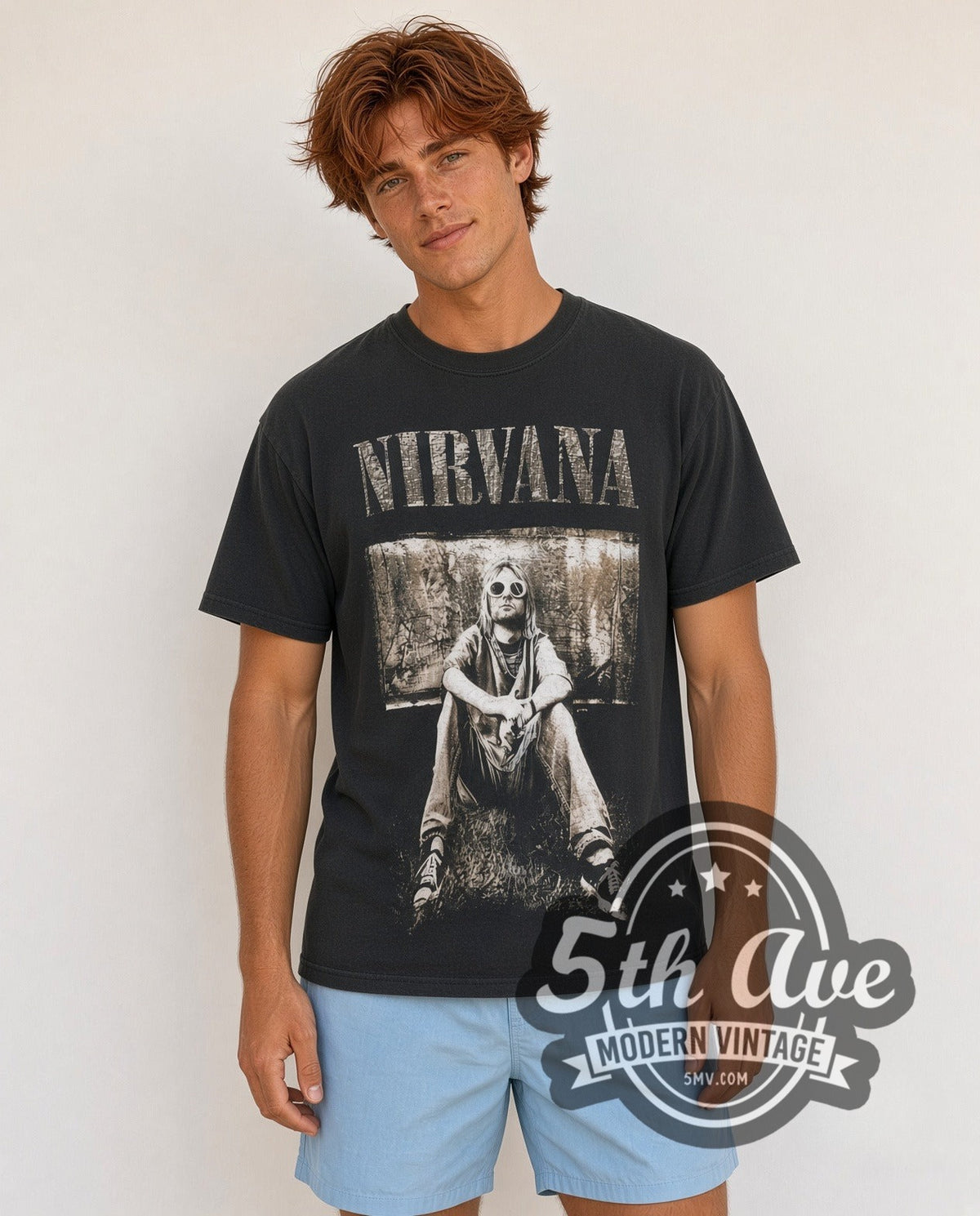 Model wearing the Kurt Cobain Nirvana Retro Portrait vintage band t-shirt