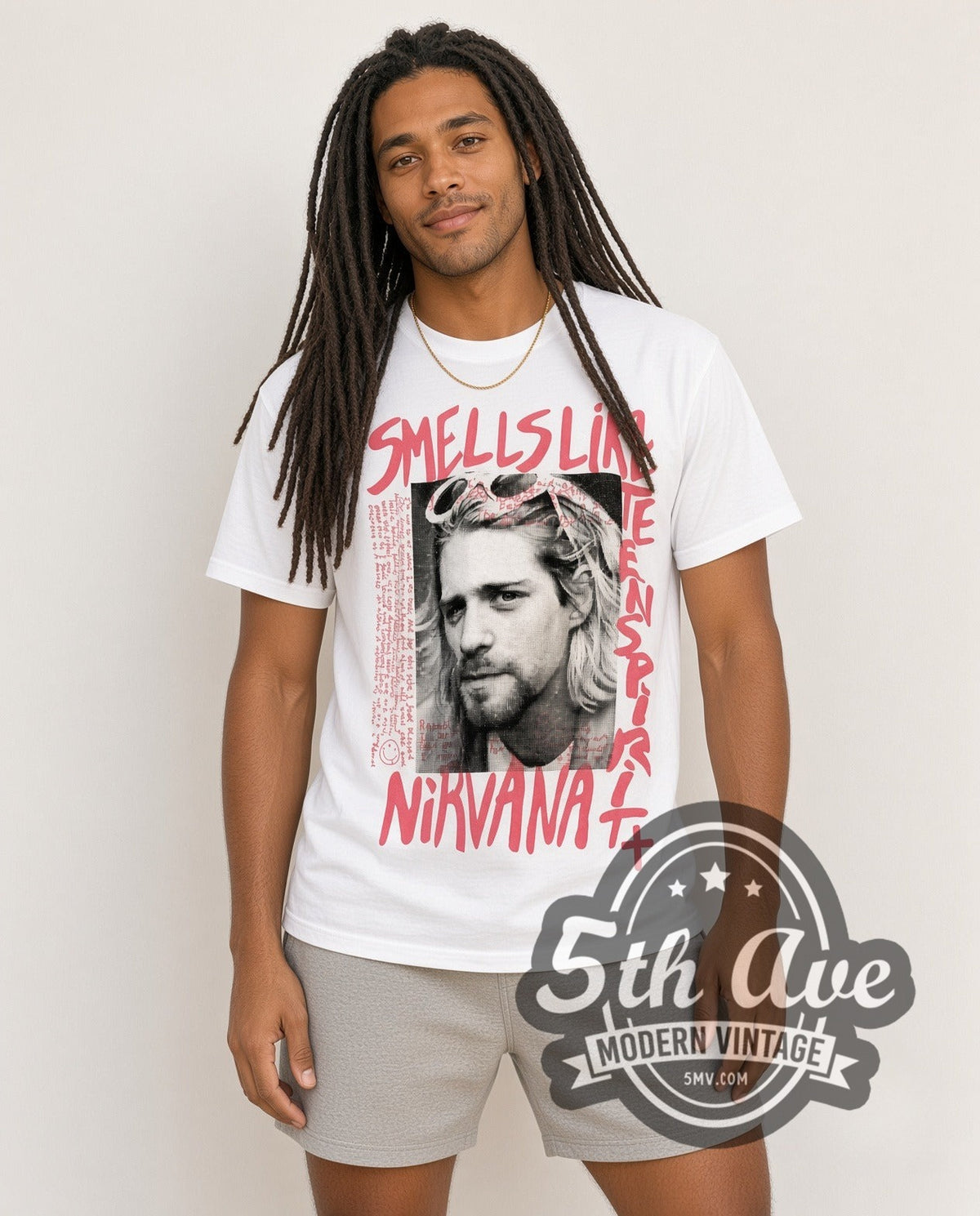 Model wearing the Nirvana Kurt Cobain Nirvana Graphic Style vintage band t-shirt