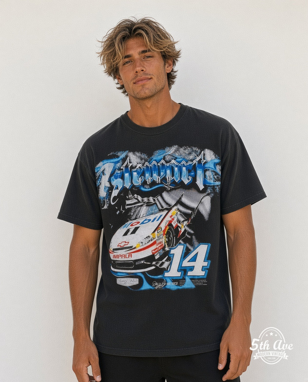 Model wearing the NASCAR Tony Stewart #14 Mobil 1 all-over-print NASCAR t-shirt in black