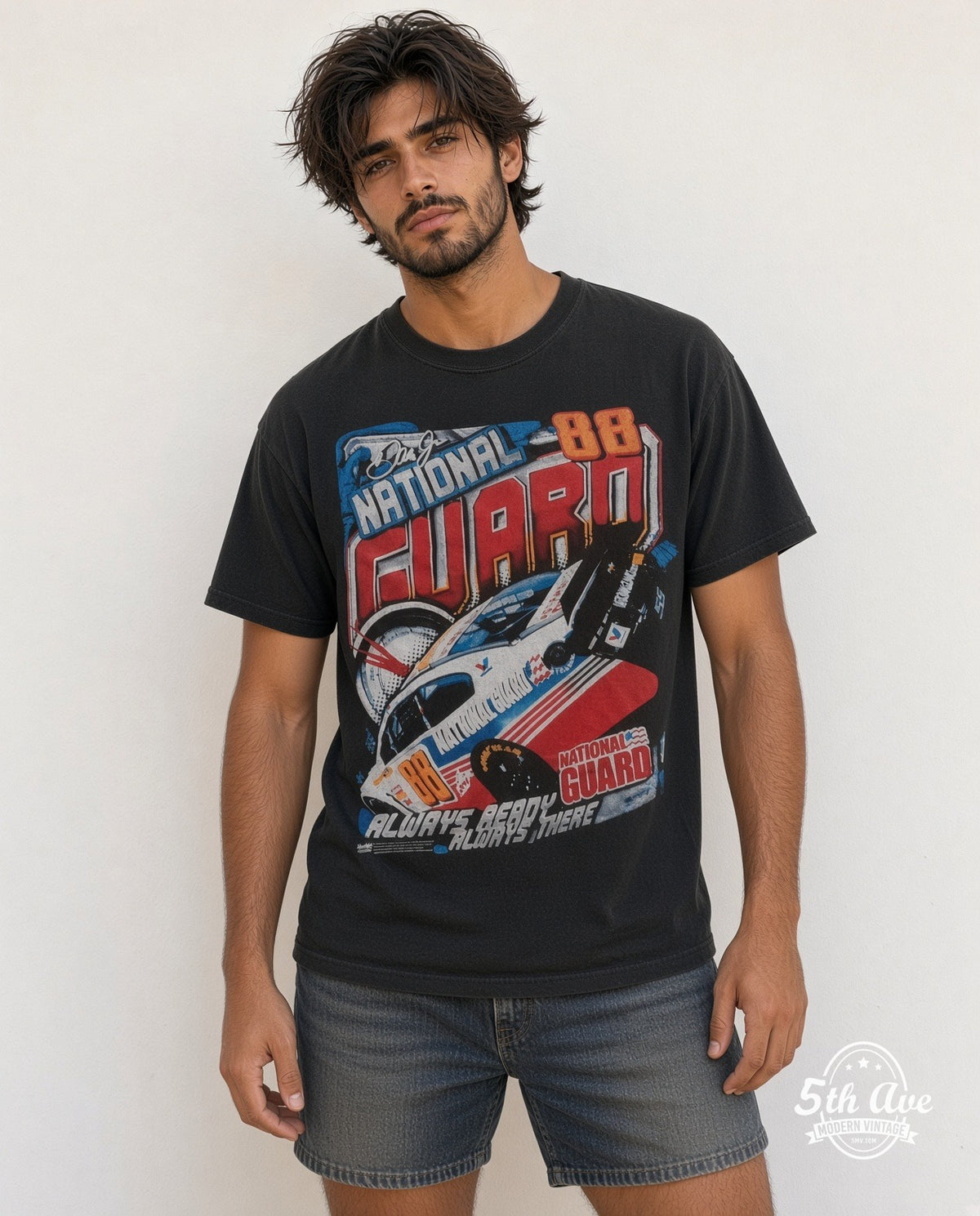 Model wearing the NASCAR Dale Earnhardt Jr. #88 National Guard Always Ready all-over-print NASCAR t-shirt in black