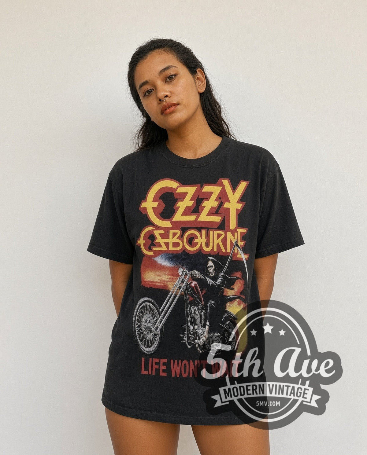 Model wearing the Ozzy Osbourne Life Won't Wait vintage band t-shirt in black