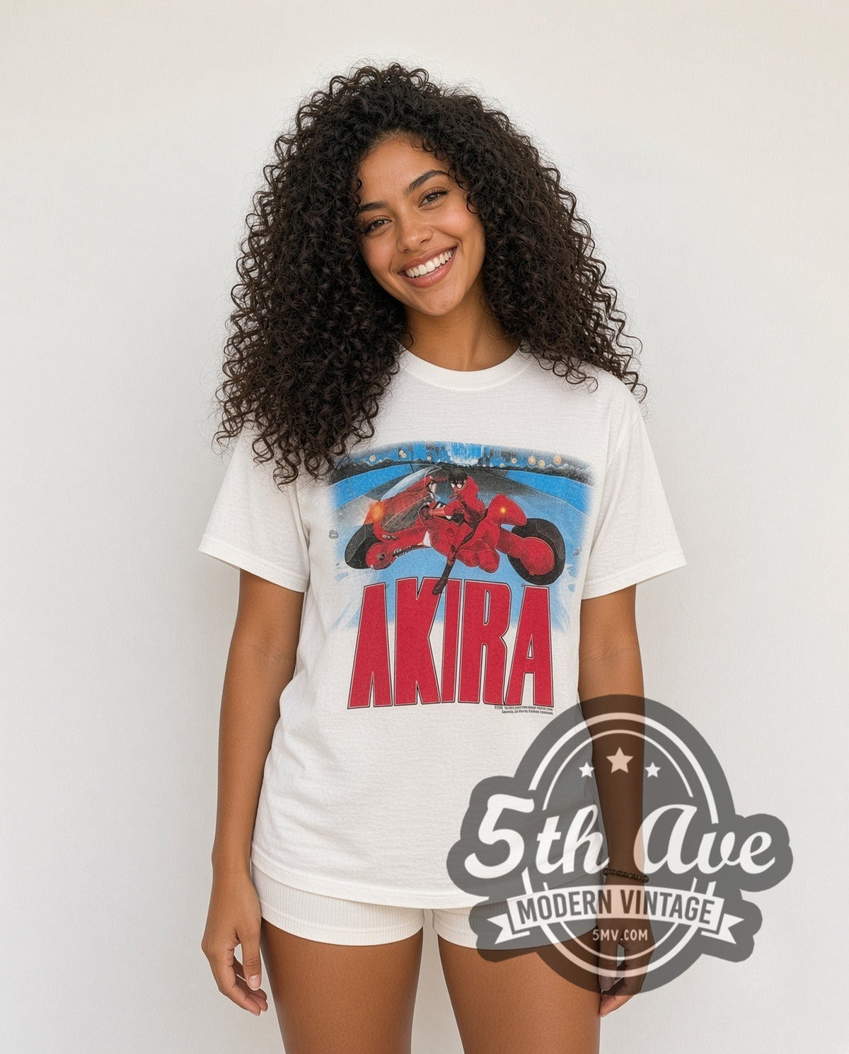 Model wearing the Akira Kaneda Motorcycle vintage graphic t-shirt in white