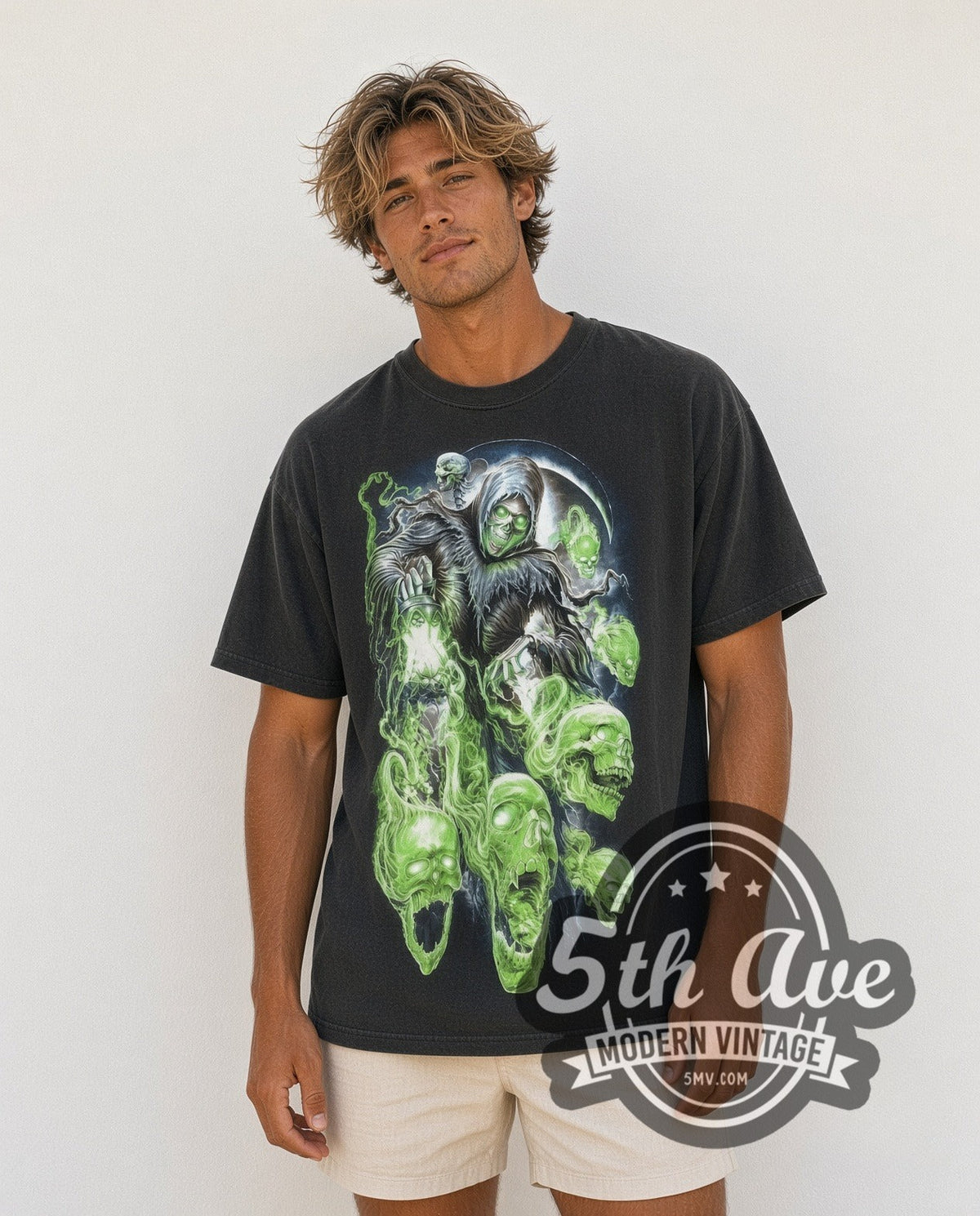 Model wearing the Reaper and Skulls Glow in the dark vintage graphic t-shirt
