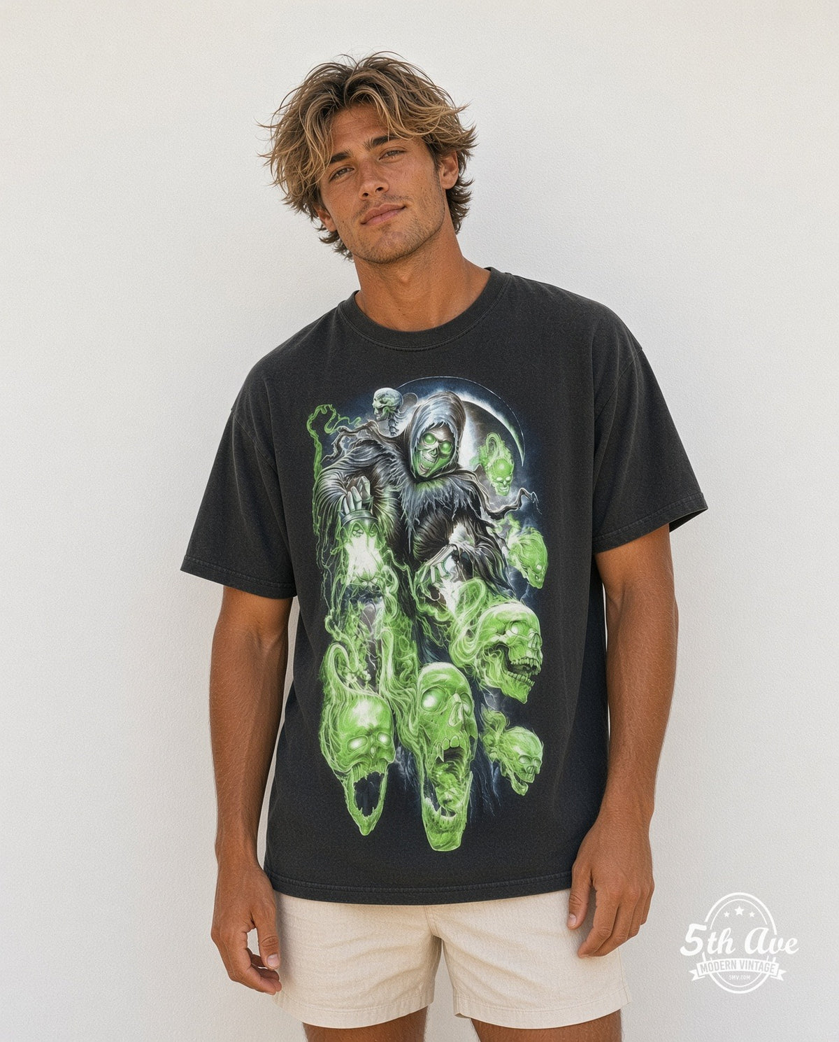 Model wearing the Reaper and Skulls Glow in the dark vintage band t-shirt