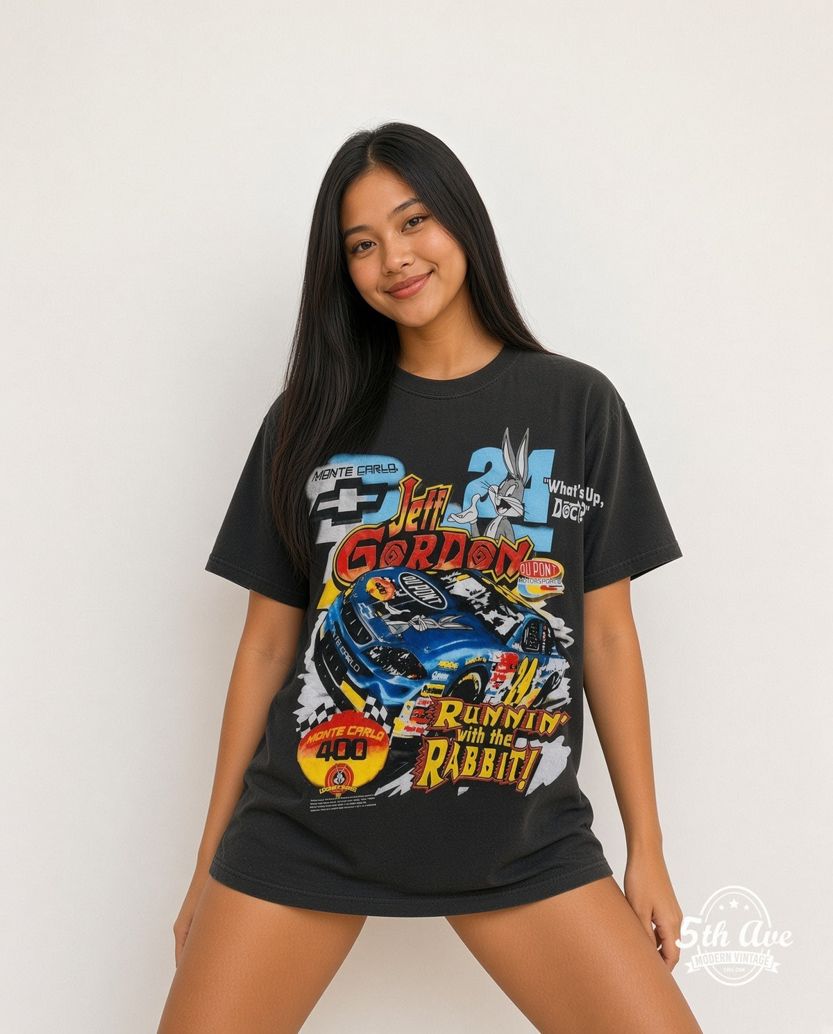 Model wearing the NASCAR Jeff Gordon #24 Runnin' With The Rabbit Bugs Bunny all-over-print NASCAR t-shirt in black