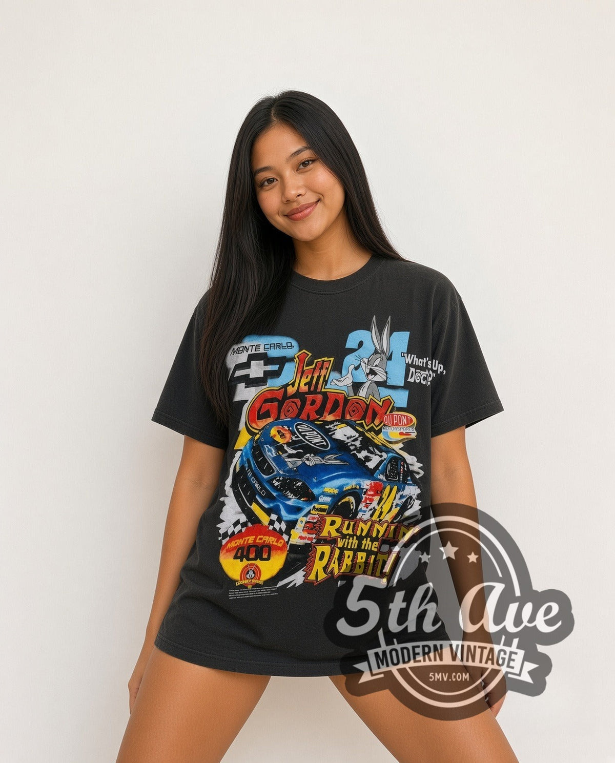 Model wearing the NASCAR Jeff Gordon #24 Runnin' With The Rabbit Bugs Bunny all-over-print vintage NASCAR t-shirt in black