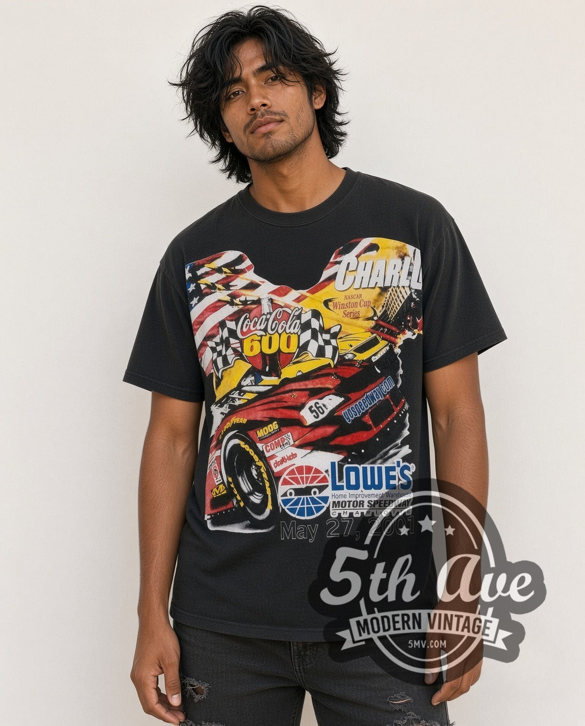 Model wearing the NASCAR Coca-Cola 600 Charlotte 2001 Lowe's all-over-print vintage NASCAR t-shirt in black