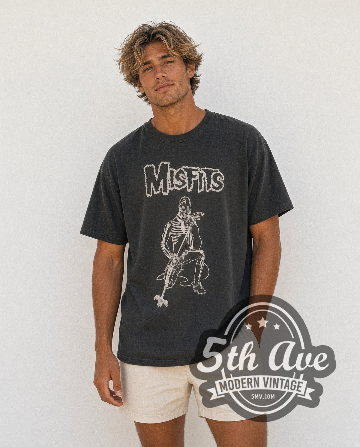 Model wearing the Misfits Kneeling Fiend with Microphone vintage band t-shirt