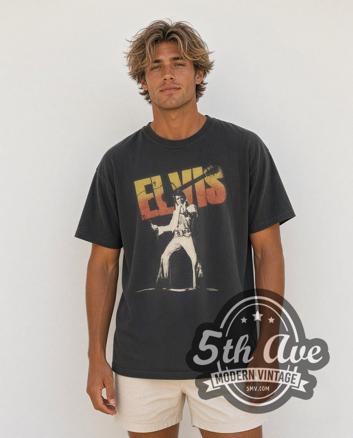 Model wearing the Elvis Presley Stage Pose Logo vintage band t-shirt