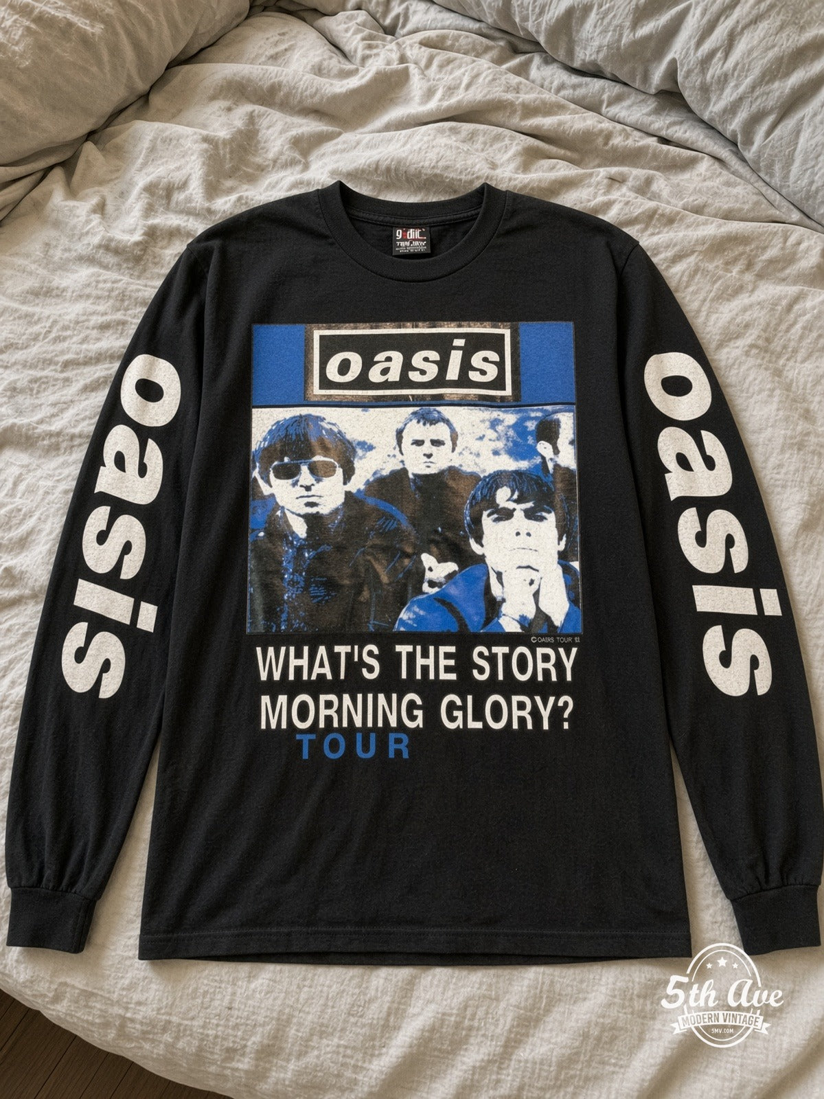 ETS LS 20 Oasis Morning Glory Tour long sleeve vintage tee laid on a bed