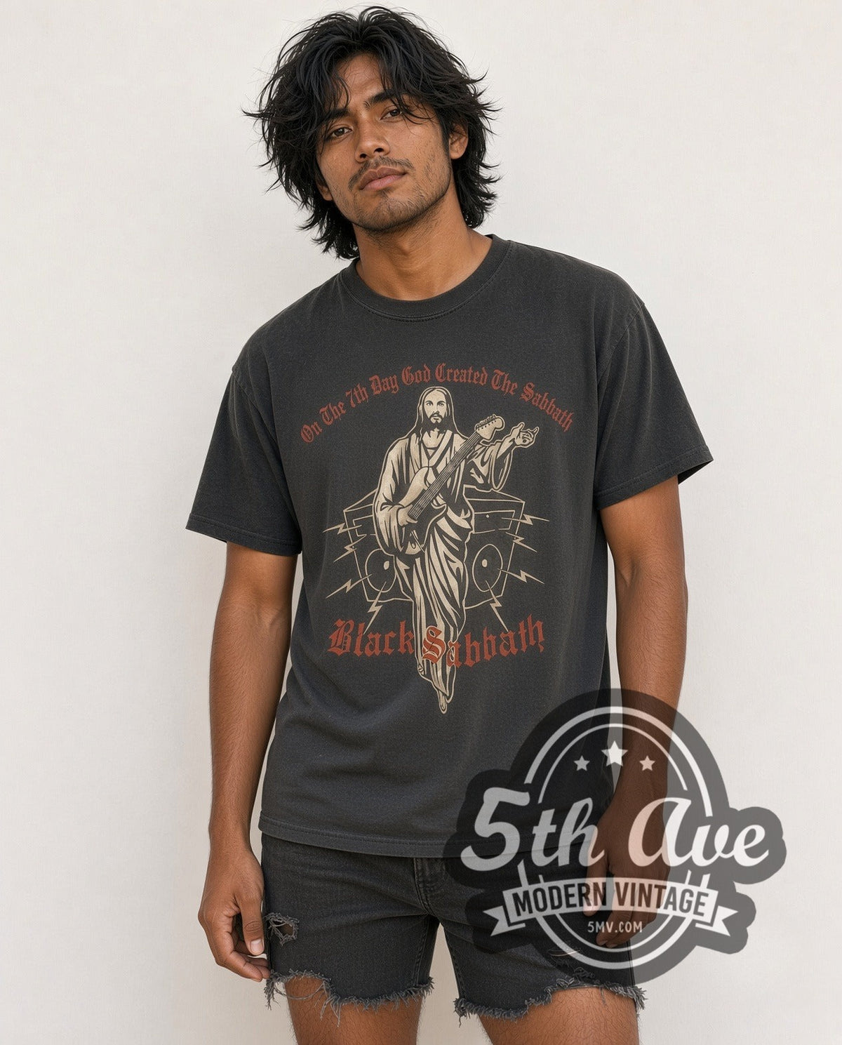 Model wearing the Black Sabbath Divine Riffs vintage band t-shirt