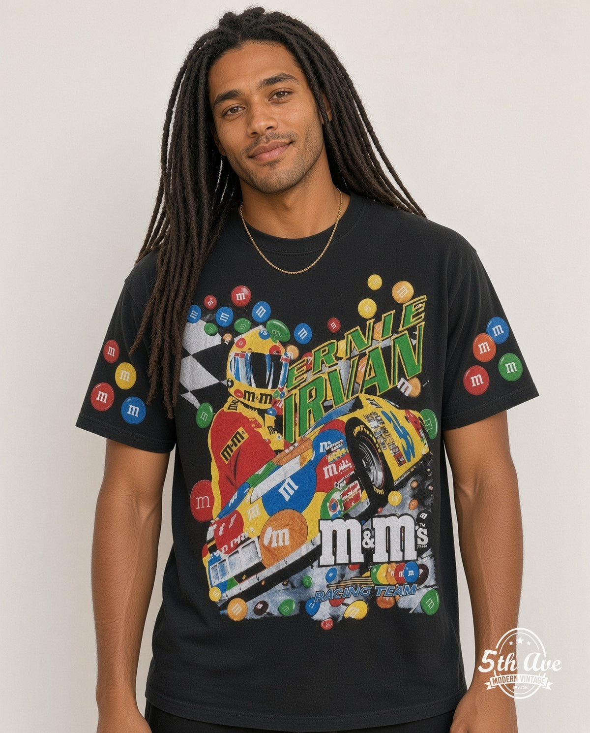 Model wearing the NASCAR Ernie Irvan #36 M&M's Angled Car all-over-print NASCAR t-shirt in black