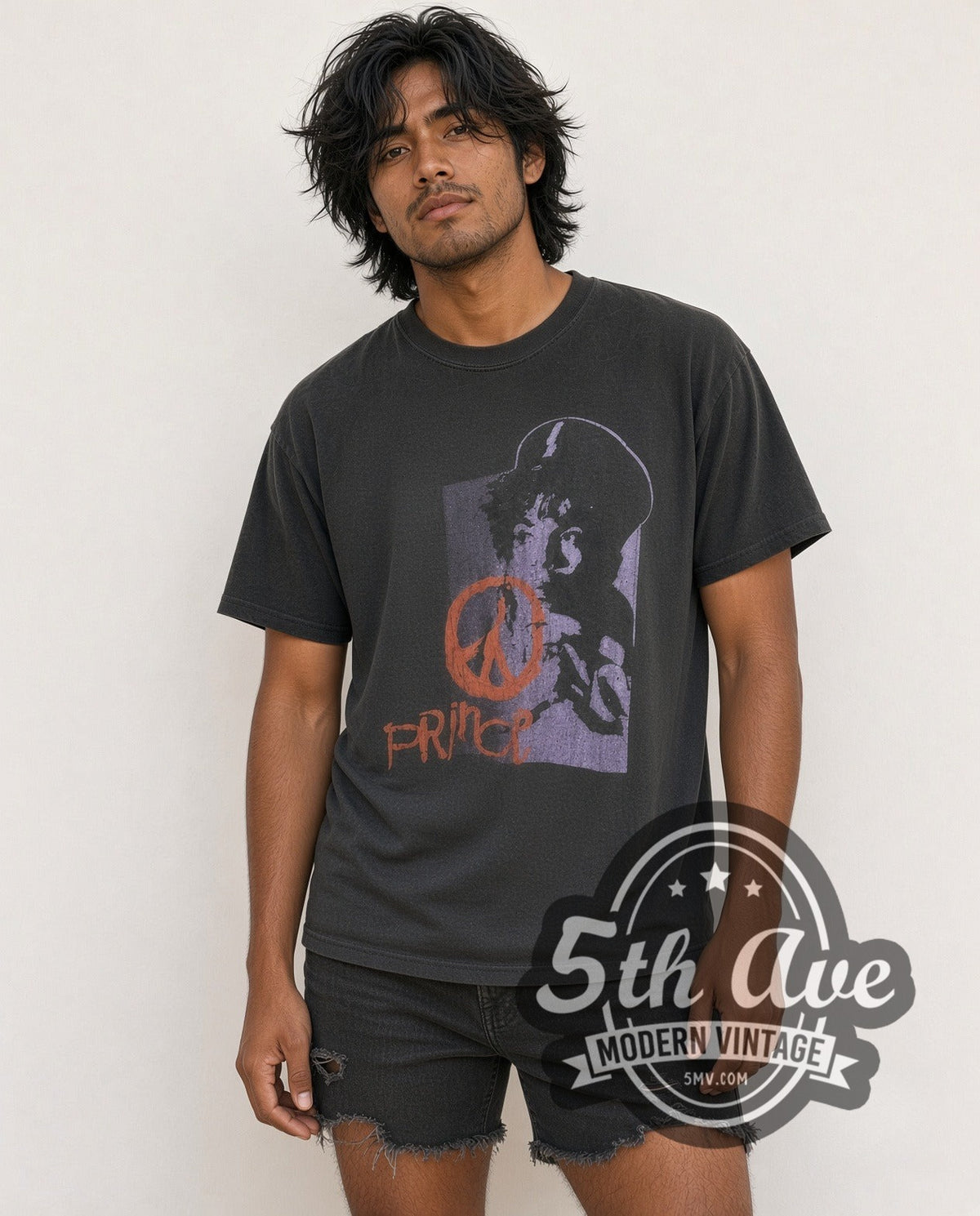 Model wearing the Prince Purple Portrait Orange Peace Sign vintage band t-shirt