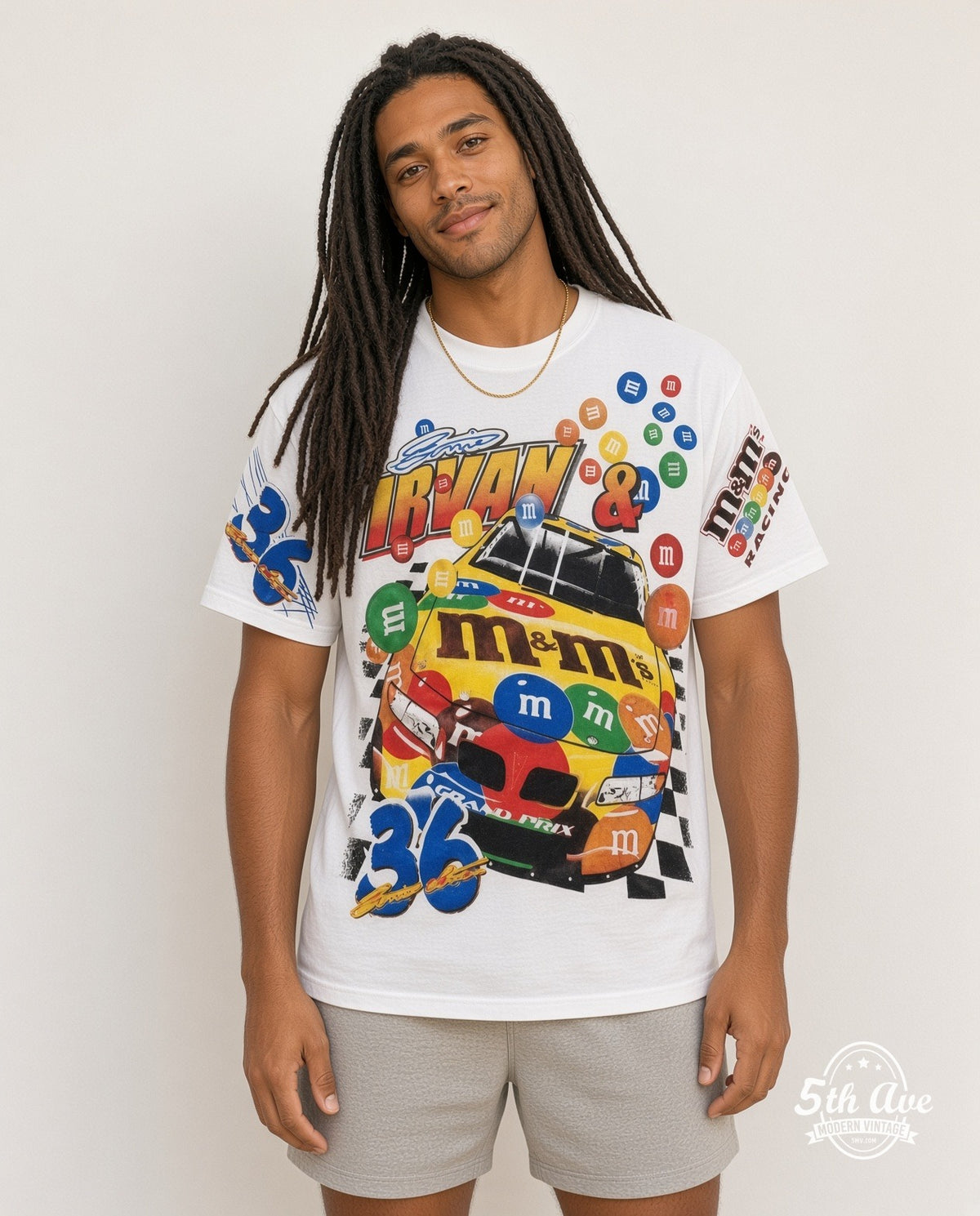 Model wearing the NASCAR Ernie Irvan #36 M&M's Racing all-over-print NASCAR t-shirt in white