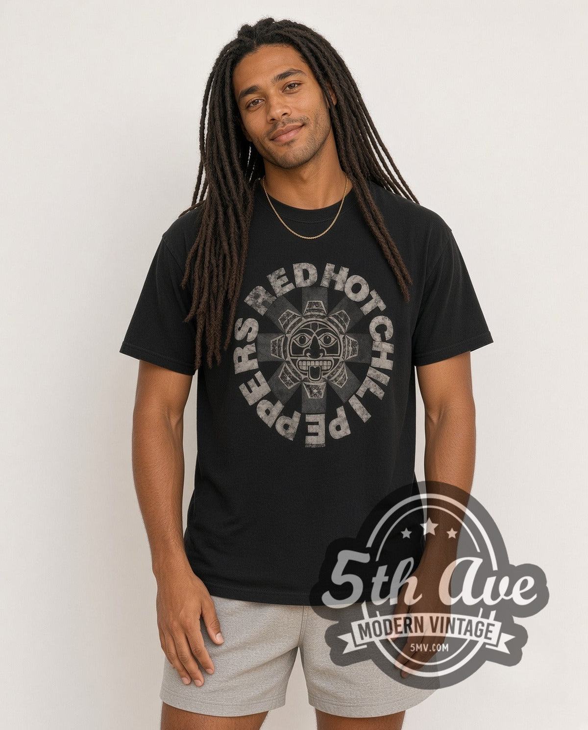 Model wearing the Red Hot Chili Peppers Aztec Sun Face Asterisk Black vintage band t-shirt in black