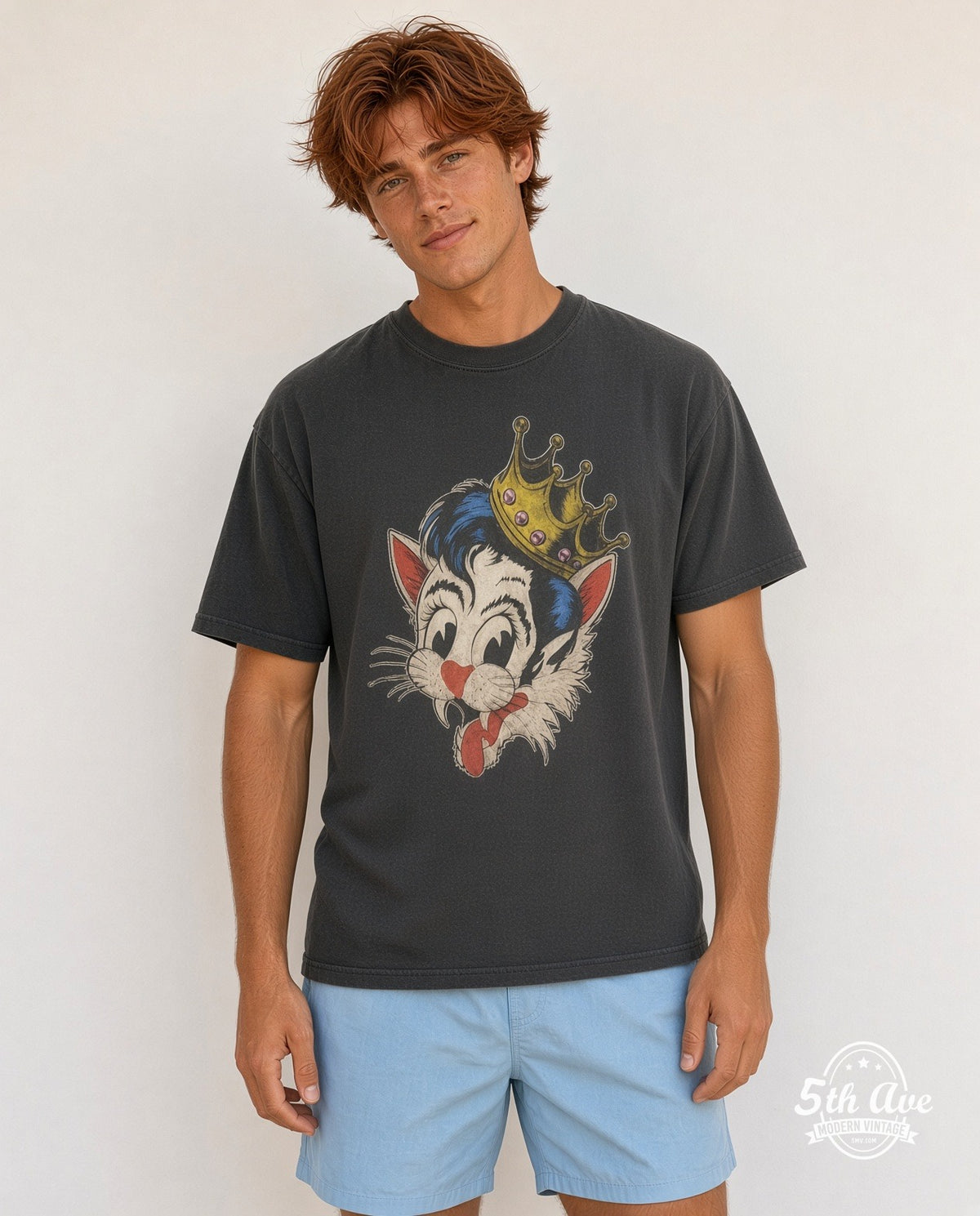 Model wearing the Stray Cats Crowned Blue Pompadour Cat vintage band t-shirt