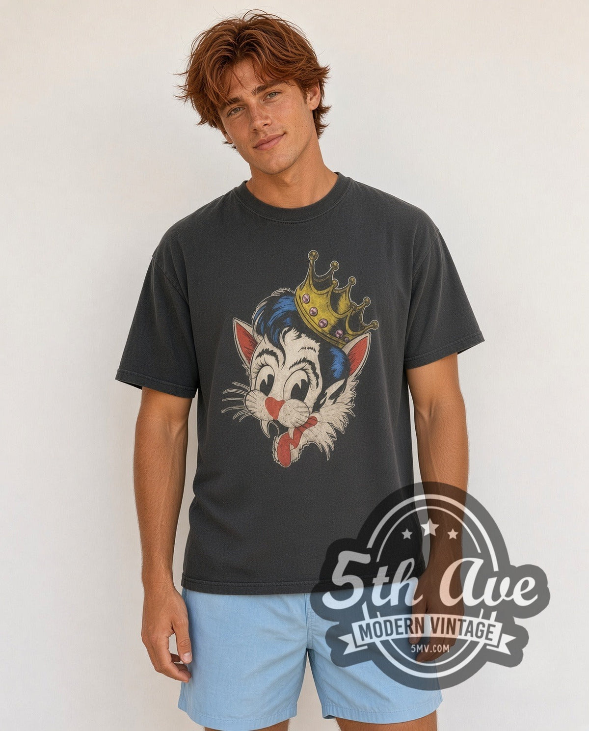Model wearing the Stray Cats Crowned Blue Pompadour Cat vintage band t-shirt