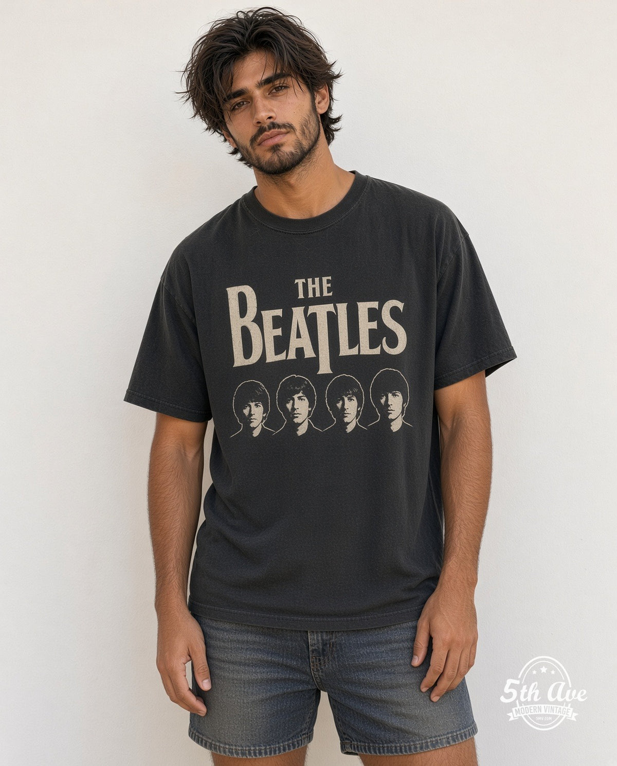 Model wearing The Beatles Four Faces Classic Logo vintage band t-shirt