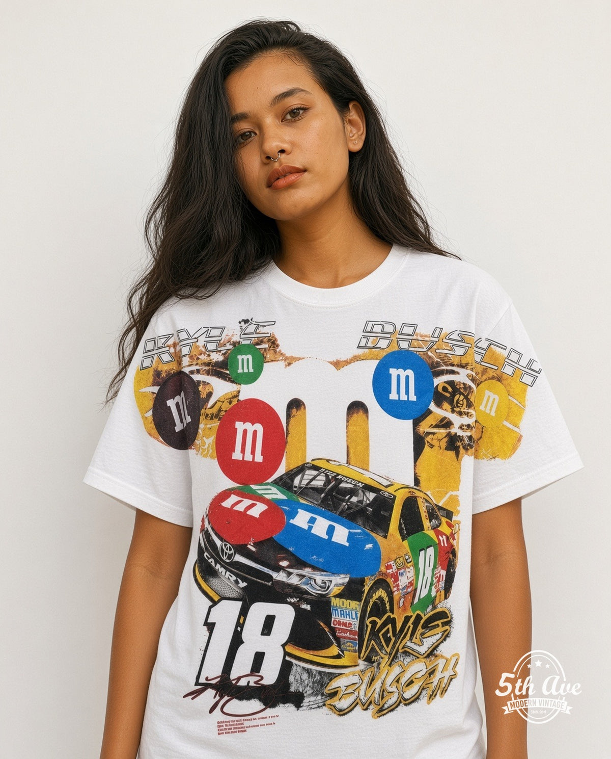 Model wearing the NASCAR Kyle Busch #18 M&M's Characters all-over-print NASCAR t-shirt in white