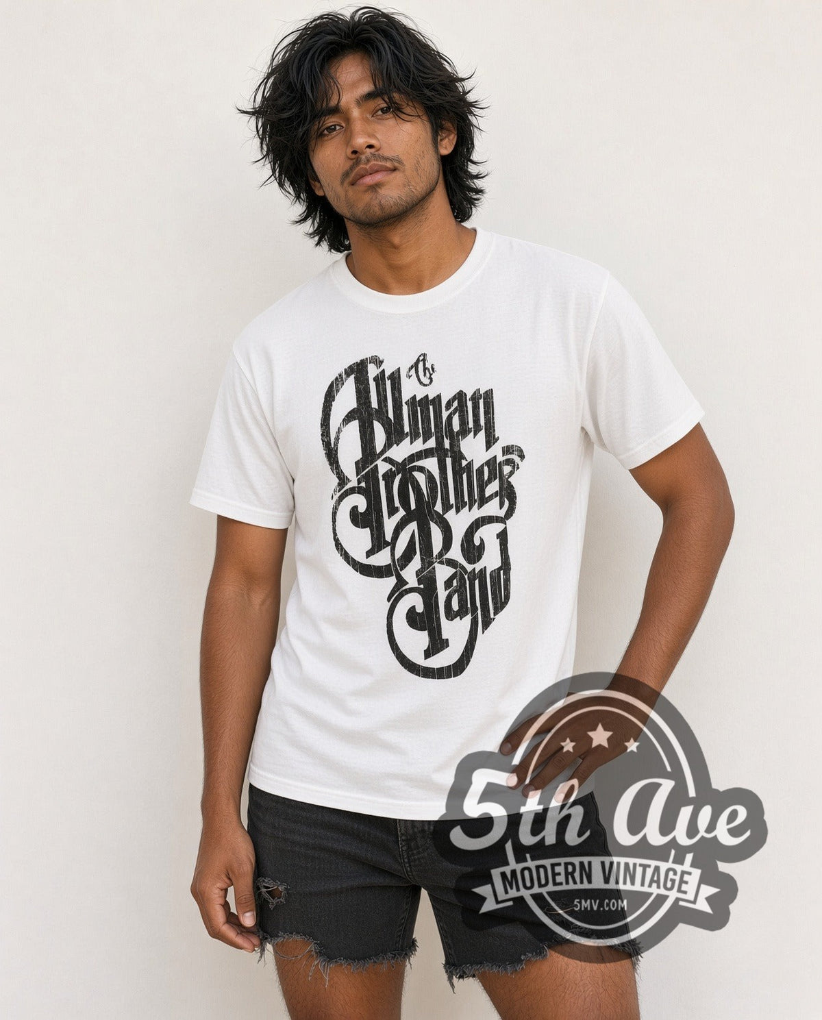 Model wearing The Allman Brothers Band Black Distressed Script Logo vintage band t-shirt in white