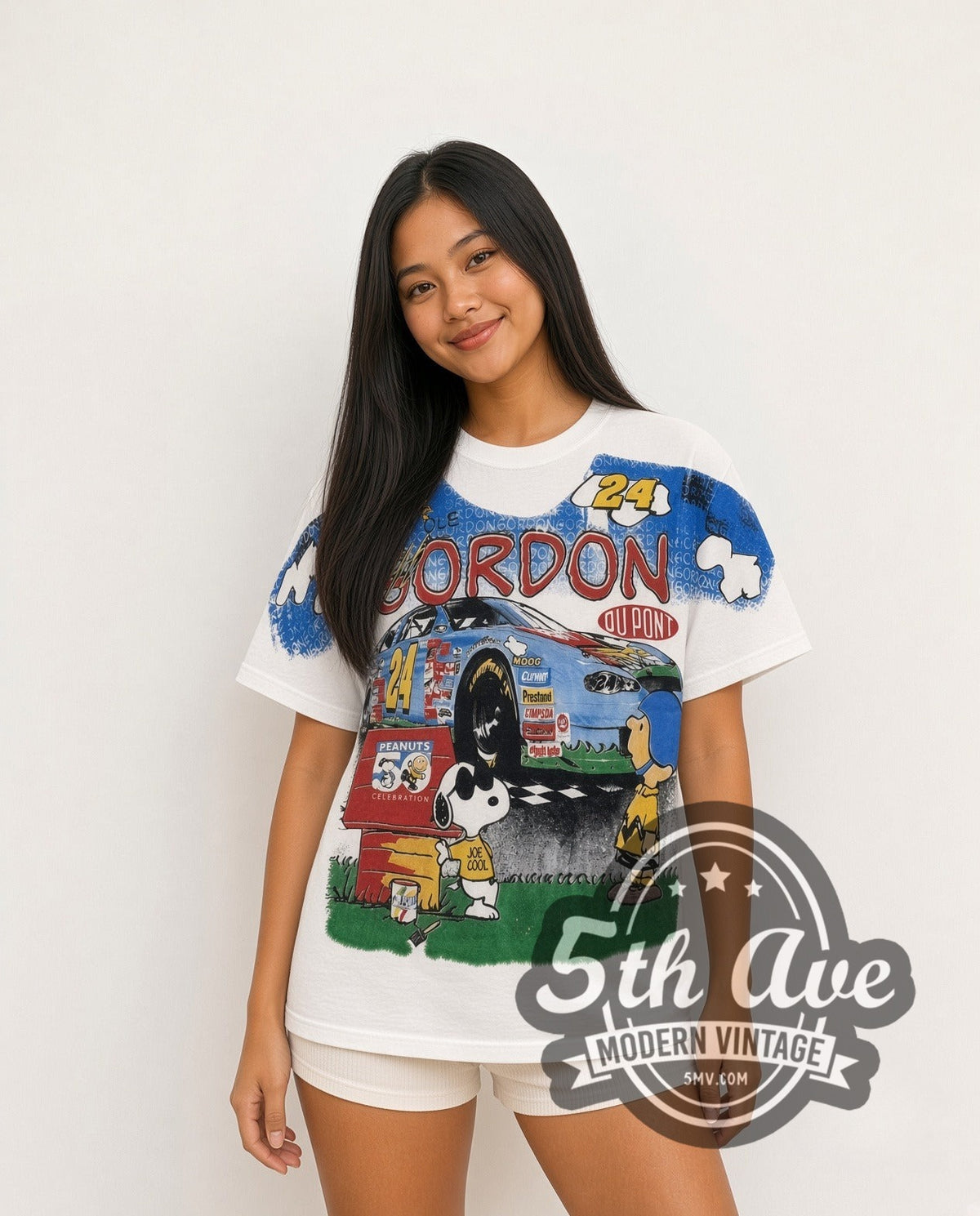 Model wearing the NASCAR Jeff Gordon #24 Good Ol Gordon Peanuts Snoopy all-over-print vintage NASCAR t-shirt in white