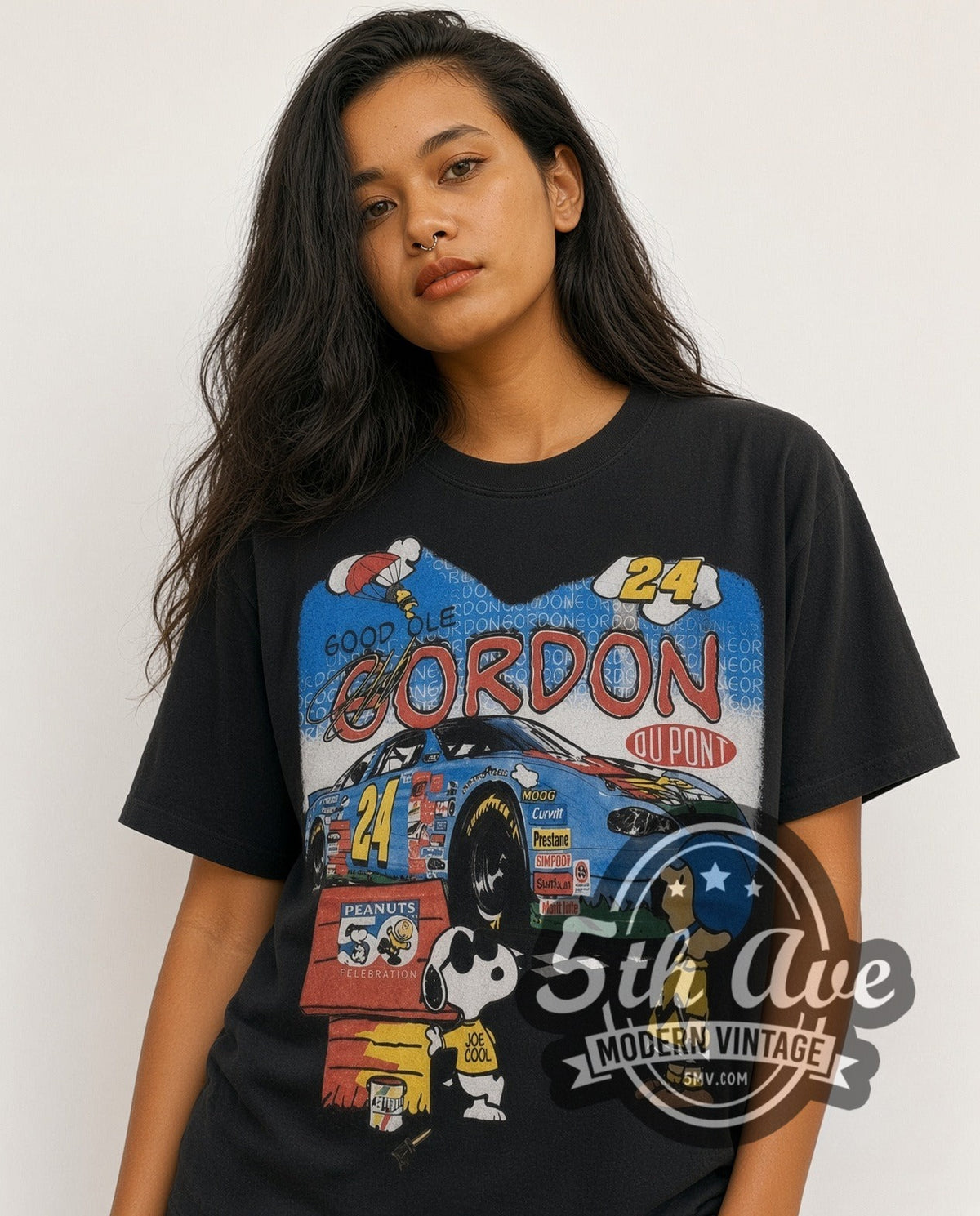 Model wearing the NASCAR Jeff Gordon #24 Good Ol Gordon Peanuts Snoopy all-over-print vintage NASCAR t-shirt in black