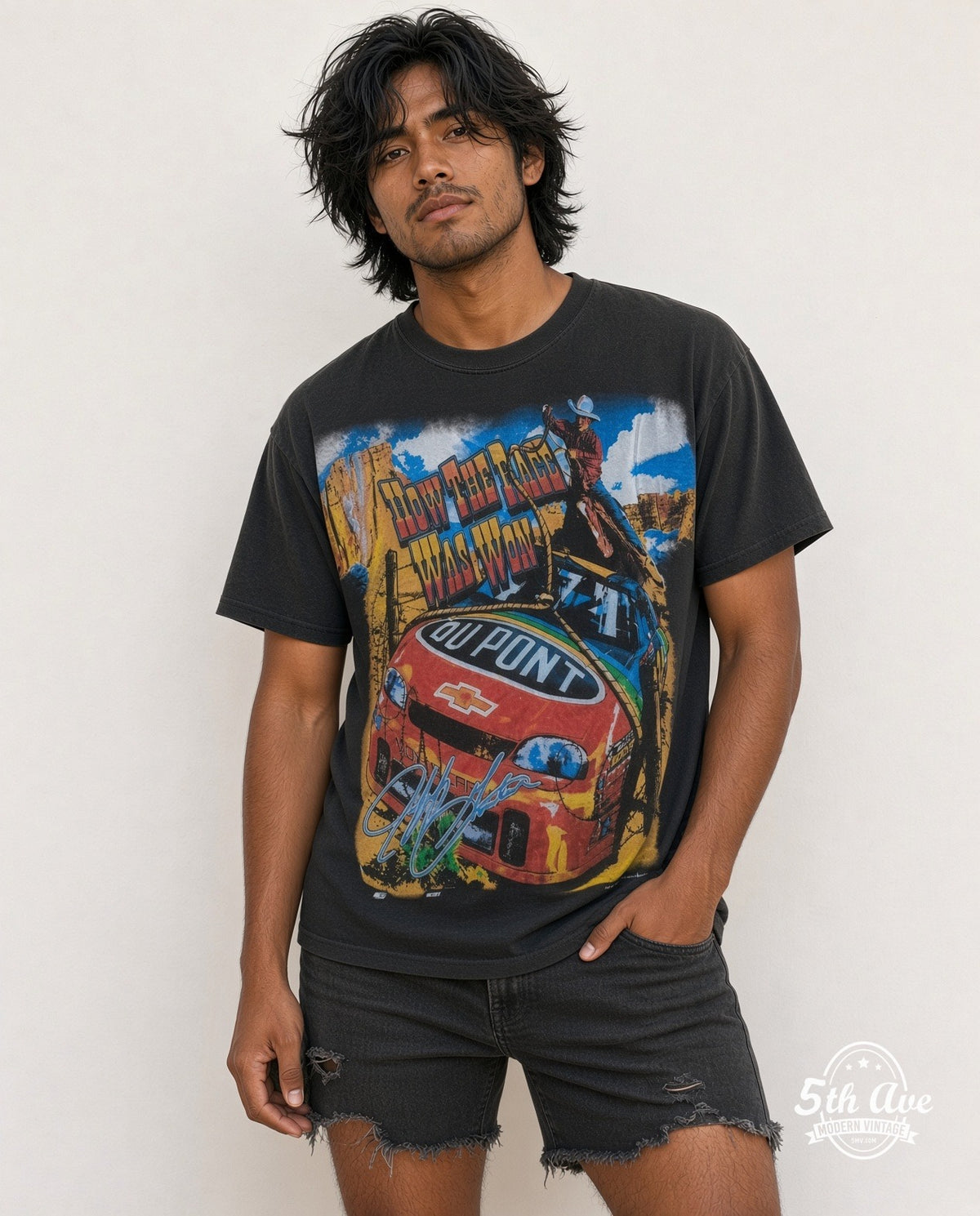 Model wearing the NASCAR Jeff Gordon #24 How The West Was Won all-over-print NASCAR t-shirt in black