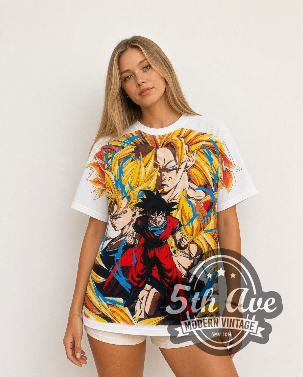 Model wearing the Dragon Ball Z Goku Super Saiyan Forms all-over-print vintage cartoon t-shirt in white