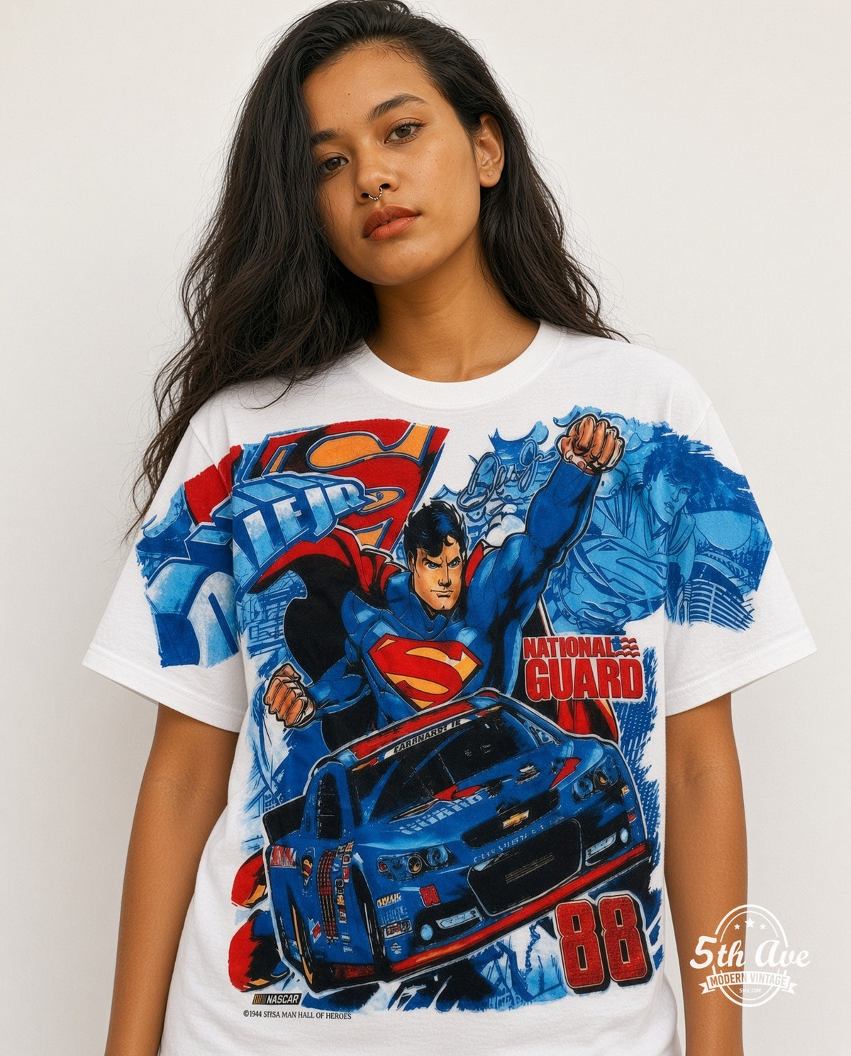 Model wearing the NASCAR Superman & Dale Earnhardt Jr. #88 National Guard all-over-print NASCAR t-shirt in white