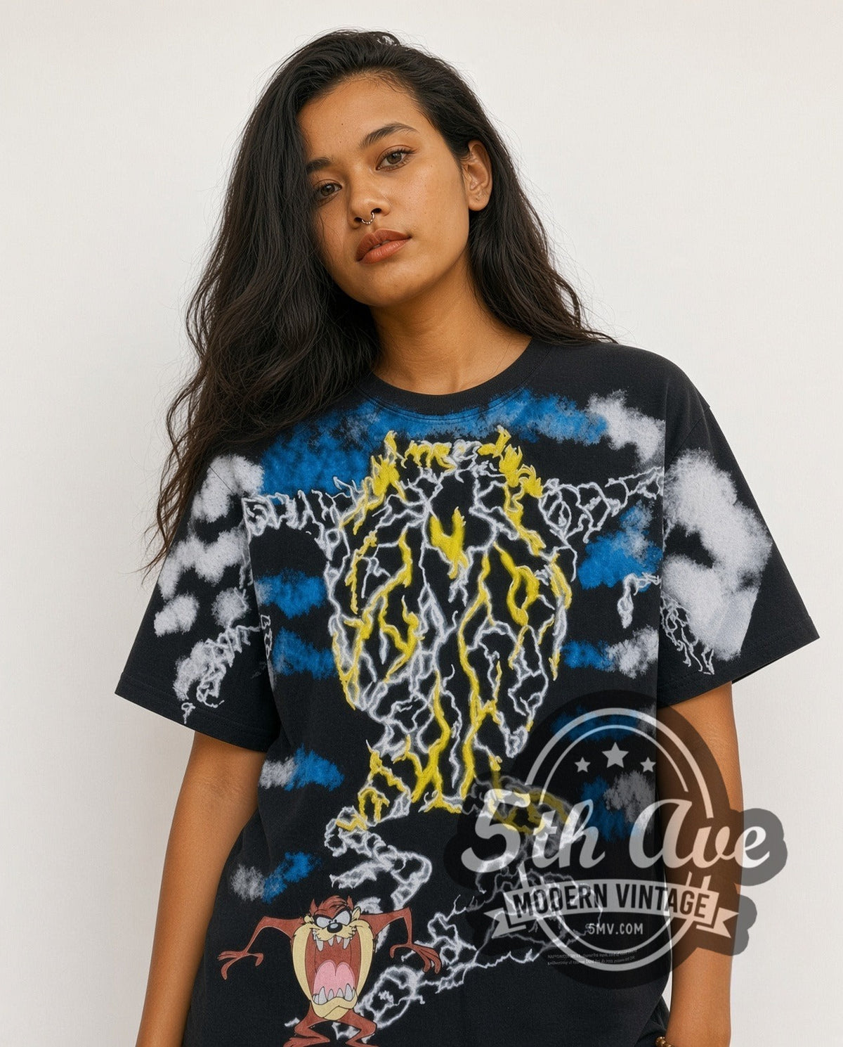 Model wearing the Looney Tunes Taz Tornado Lightning all-over-print vintage cartoon t-shirt