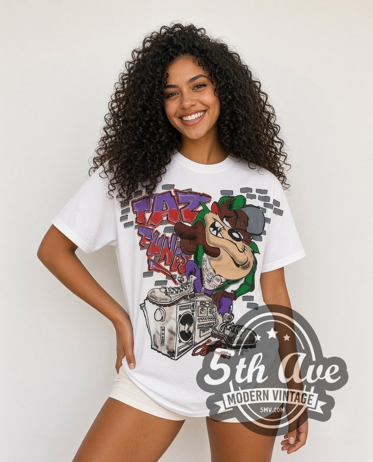 Model wearing the Looney Tunes Taz Funk Boombox all-over-print vintage cartoon t-shirt in white