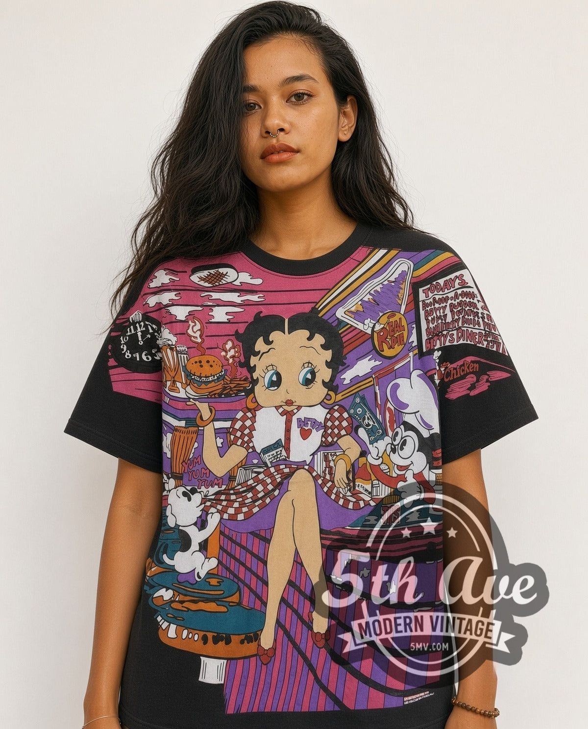 Model wearing the Betty Boop Checkered Dress Abstract all-over-print vintage cartoon t-shirt in black