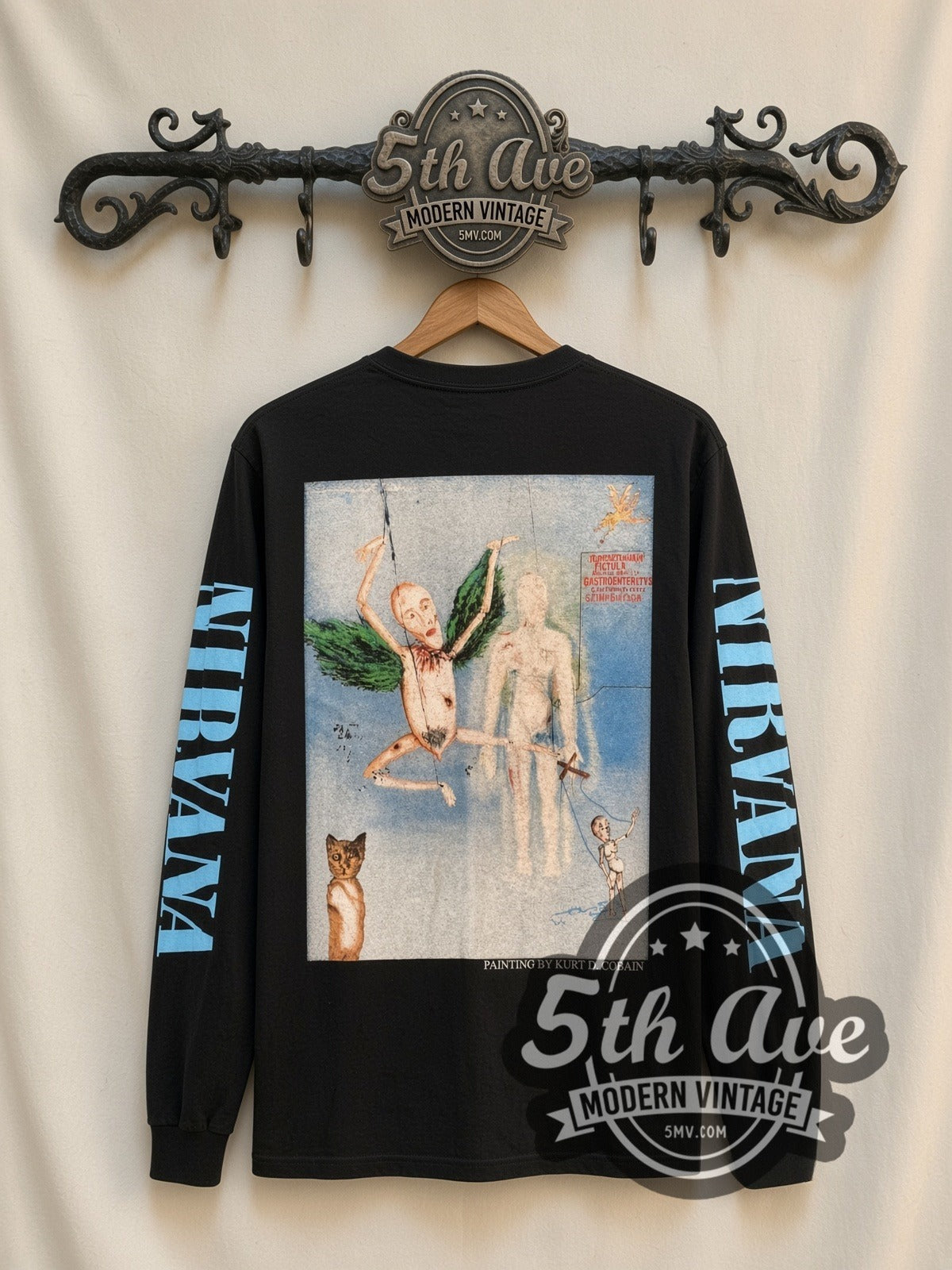 Nirvana Kurt D. Cobain 1967-1994 Portrait vintage band long sleeve t-shirt, back view on a display rack