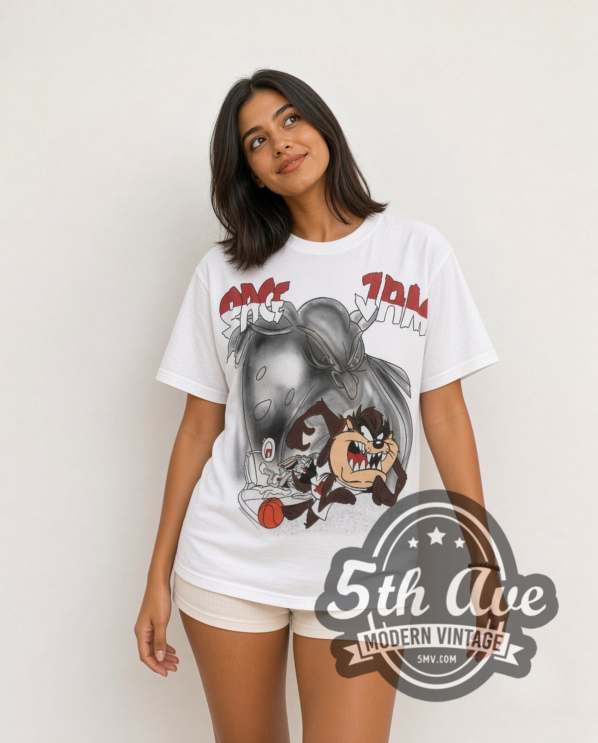Model wearing the Space Jam Taz & Monstar all-over-print vintage cartoon t-shirt in white