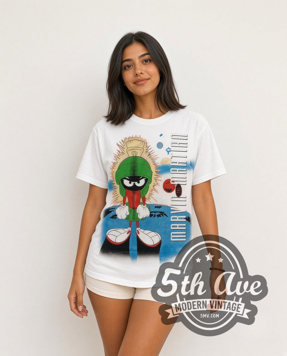 Model wearing the Looney Tunes Marvin the Martian Portrait all-over-print vintage cartoon t-shirt in white