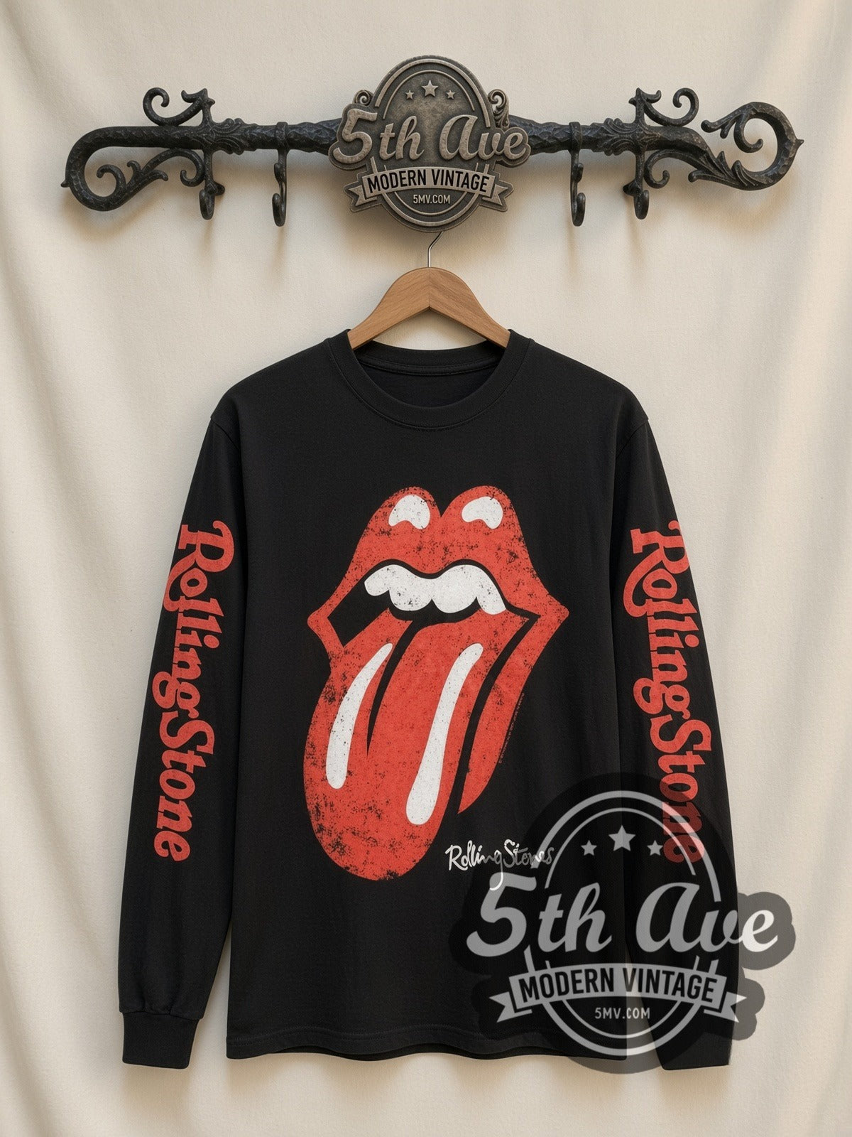 The Rolling Stones Tongue Logo vintage band long sleeve t-shirt, front view on a display rack