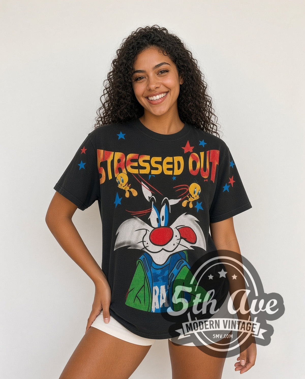 Model wearing the Looney Tunes Sylvester & Tweety Stressed Out all-over-print vintage cartoon t-shirt in black