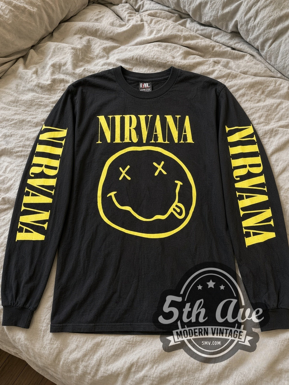 Nirvana Smiley Face vintage band long sleeve tee laid flat