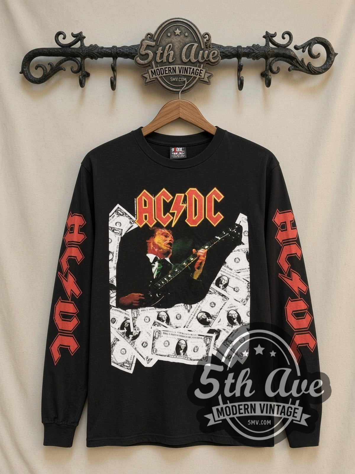 AC/DC Angus Money vintage band long sleeve t-shirt, front view on a display rack