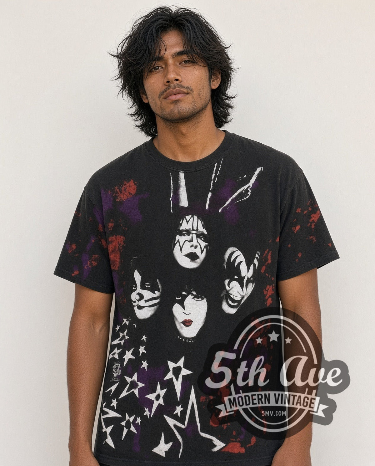 Model wearing the KISS Starfield Faces all-over-print vintage band t-shirt in black