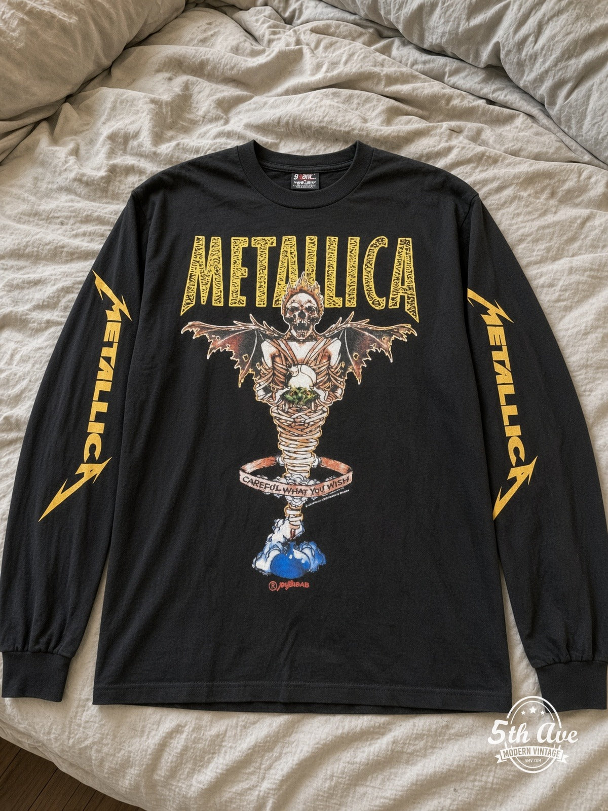 ETS LS 31 Metallica Careful What You Wish long sleeve vintage tee laid on a bed