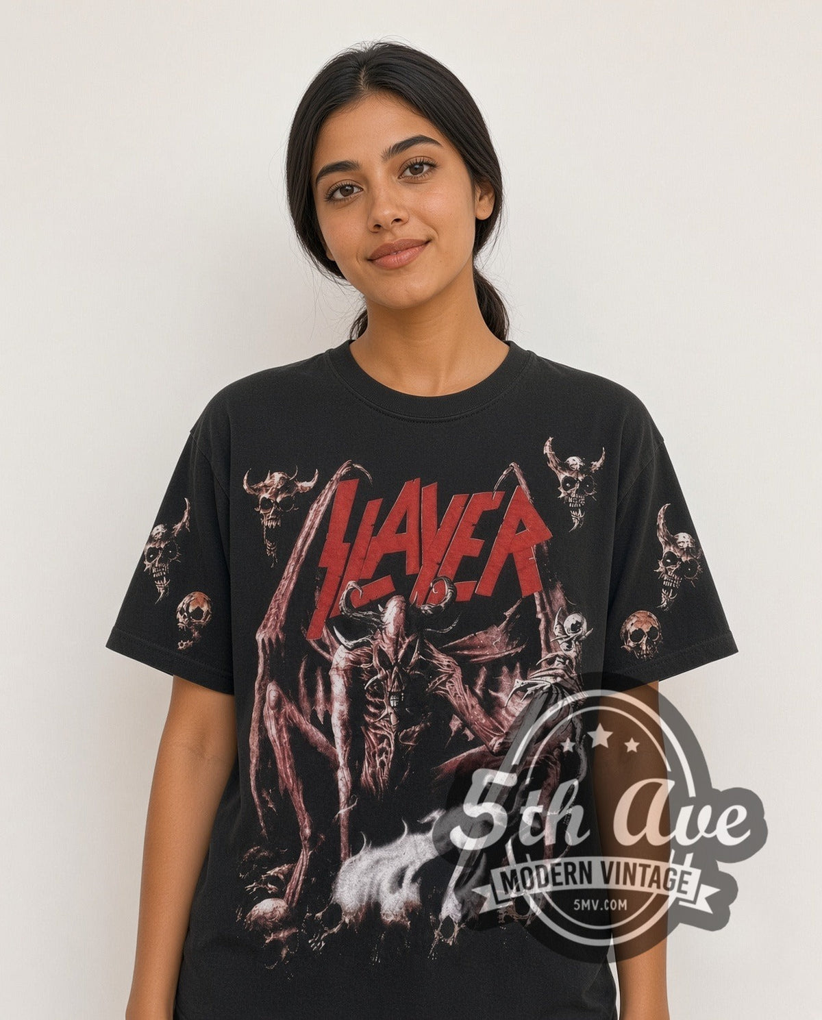 Model wearing the Slayer Skeletal Demons all-over-print vintage band t-shirt in black