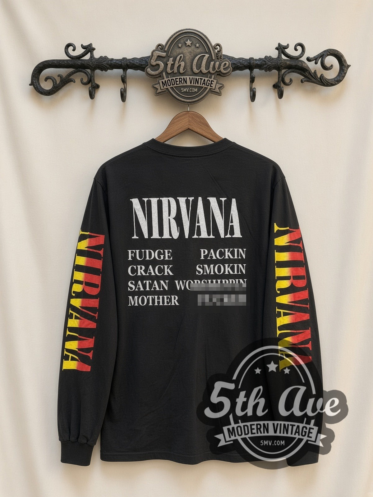 Nirvana Trio Photo vintage band long sleeve t-shirt, back view on a display rack