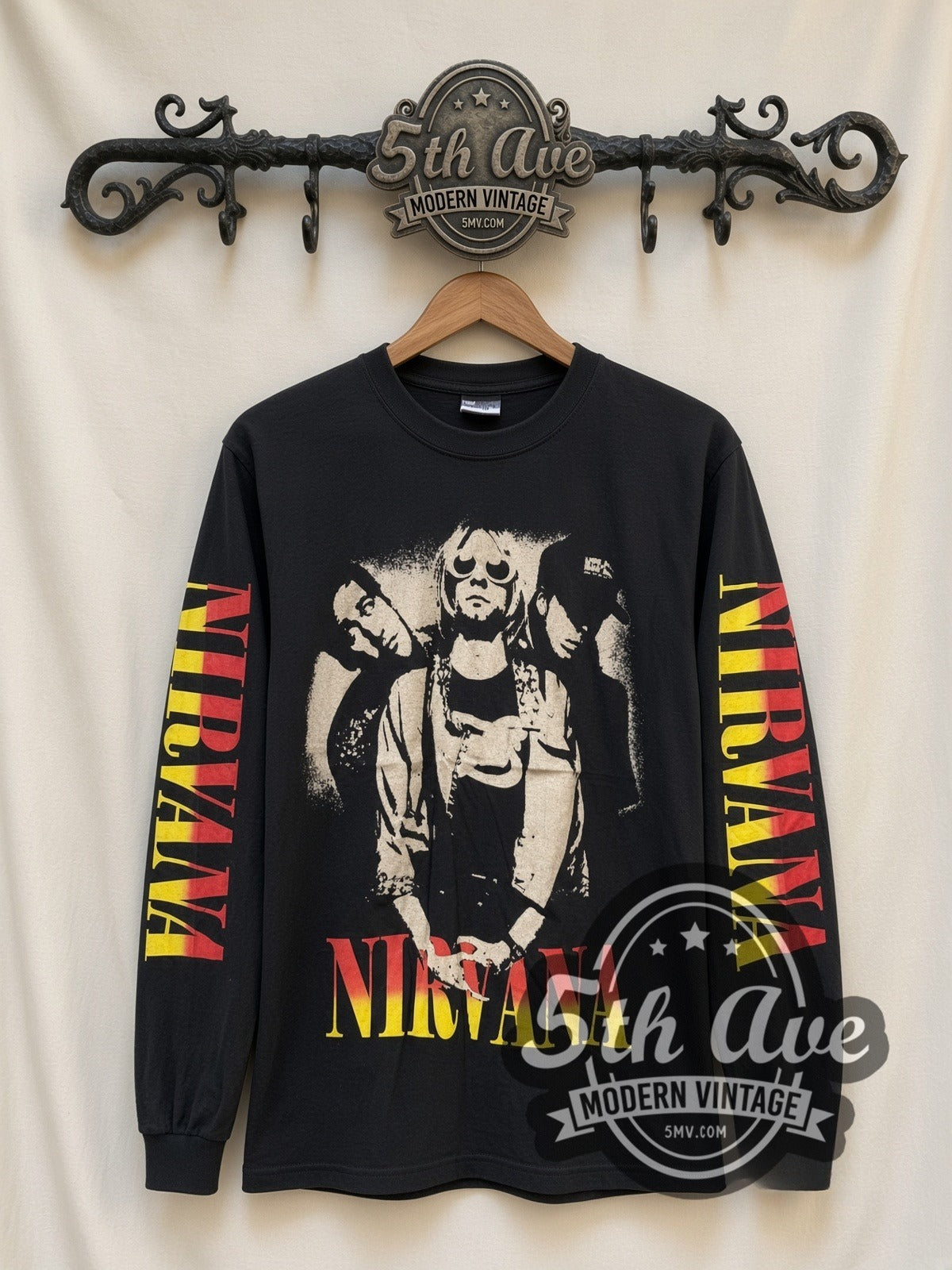 Nirvana Trio Photo vintage band long sleeve t-shirt, front view on a display rack