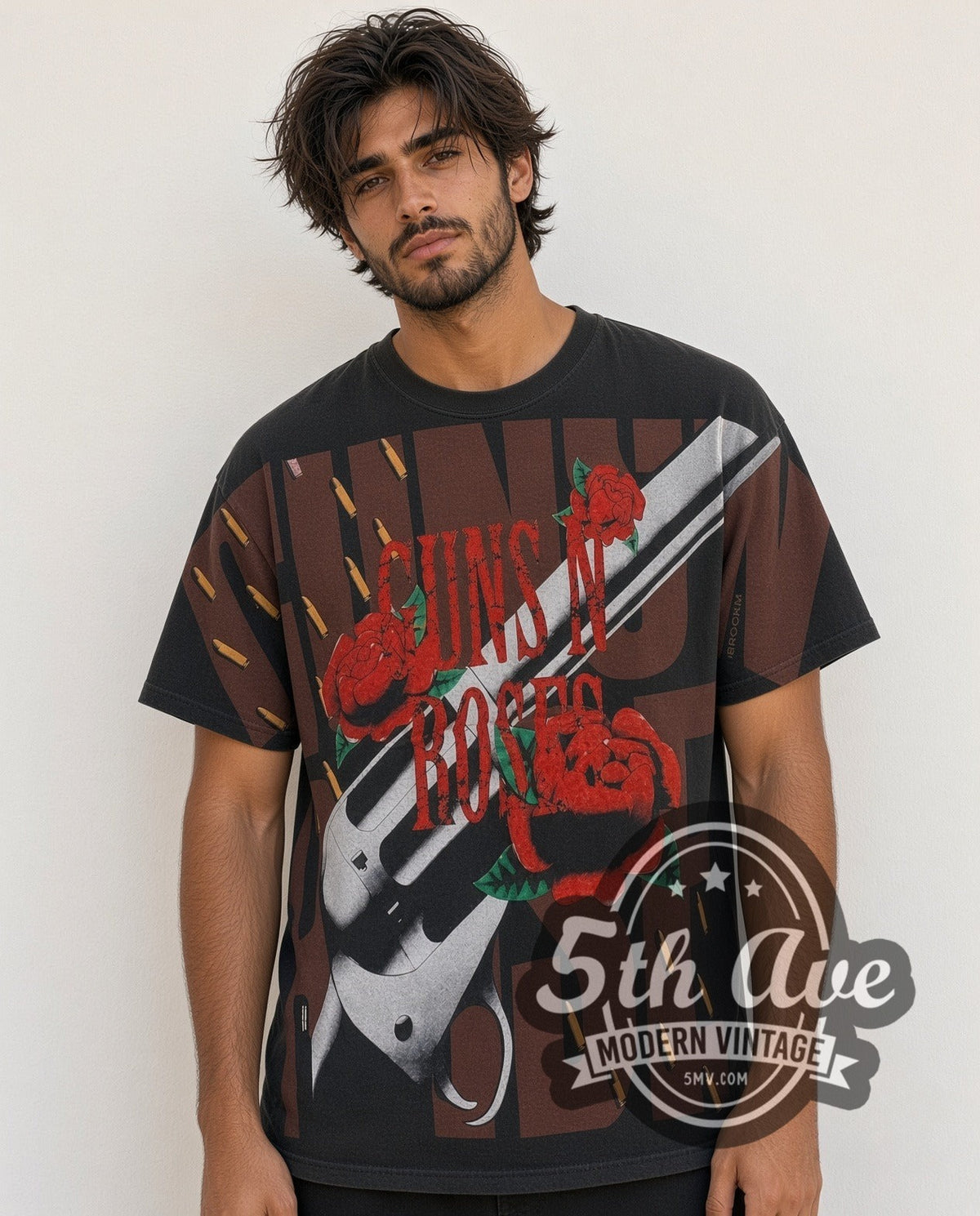 Model wearing the Guns N' Roses Revolver Roses all-over-print vintage band t-shirt in black