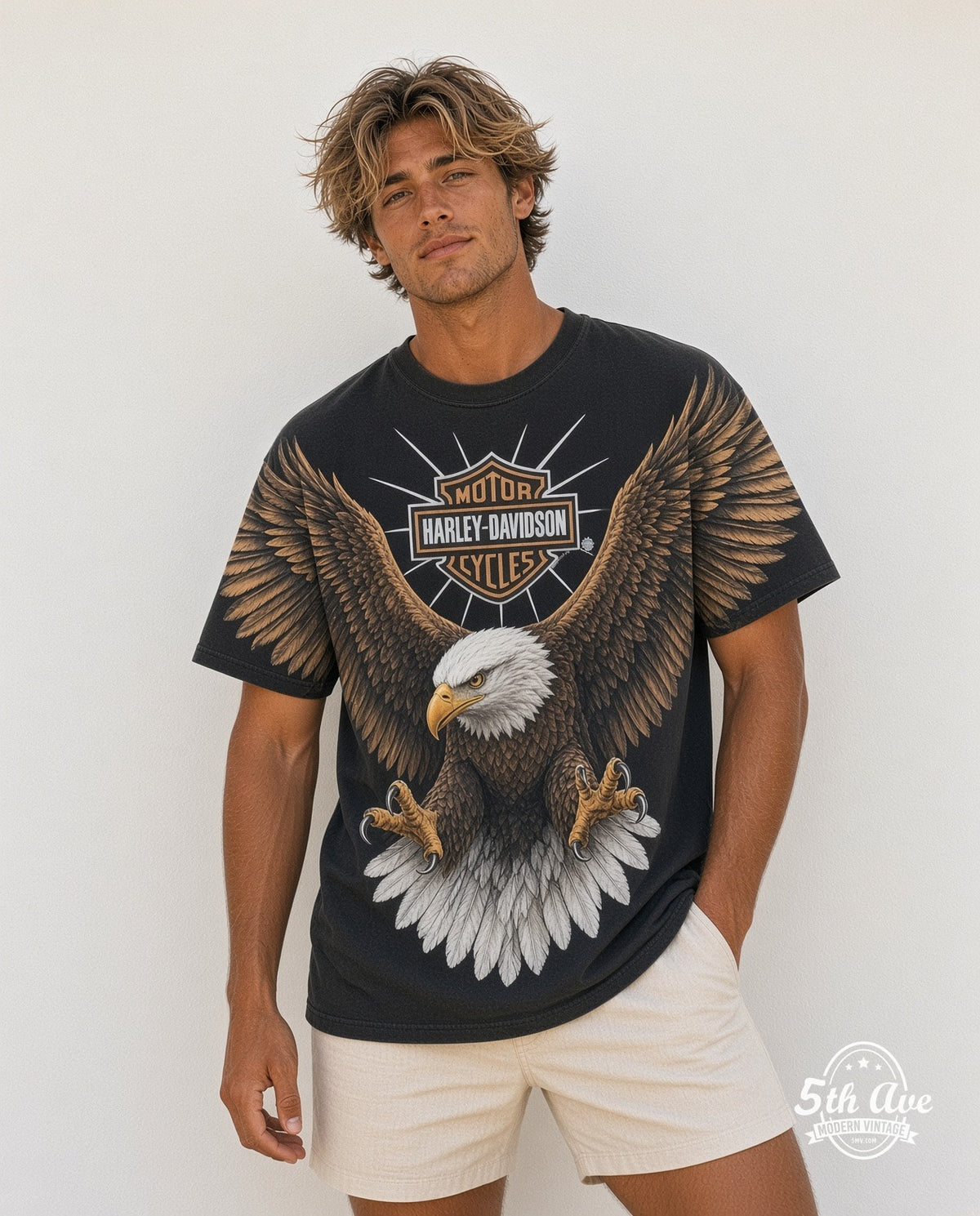 Model wearing the Harley-Davidson Bald Eagle Bar Shield all-over-print graphic tee in black