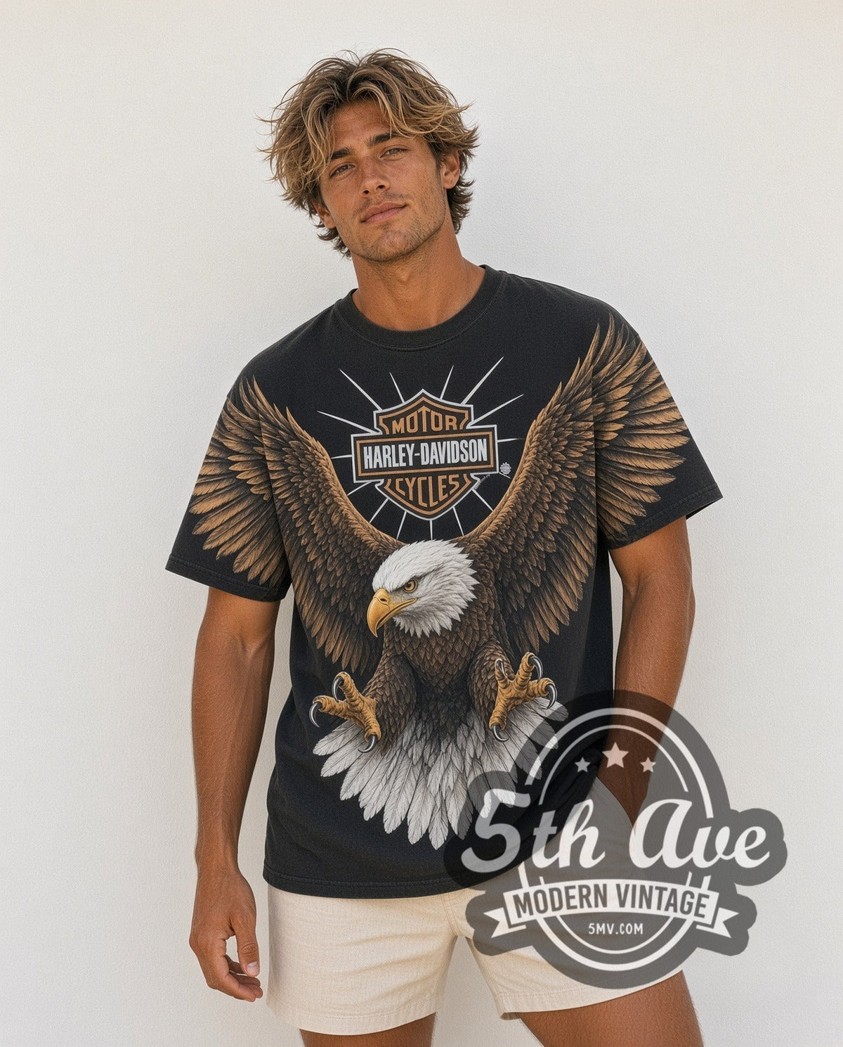 Model wearing the Harley-Davidson Bald Eagle Bar Shield all-over-print vintage Harley tee in black