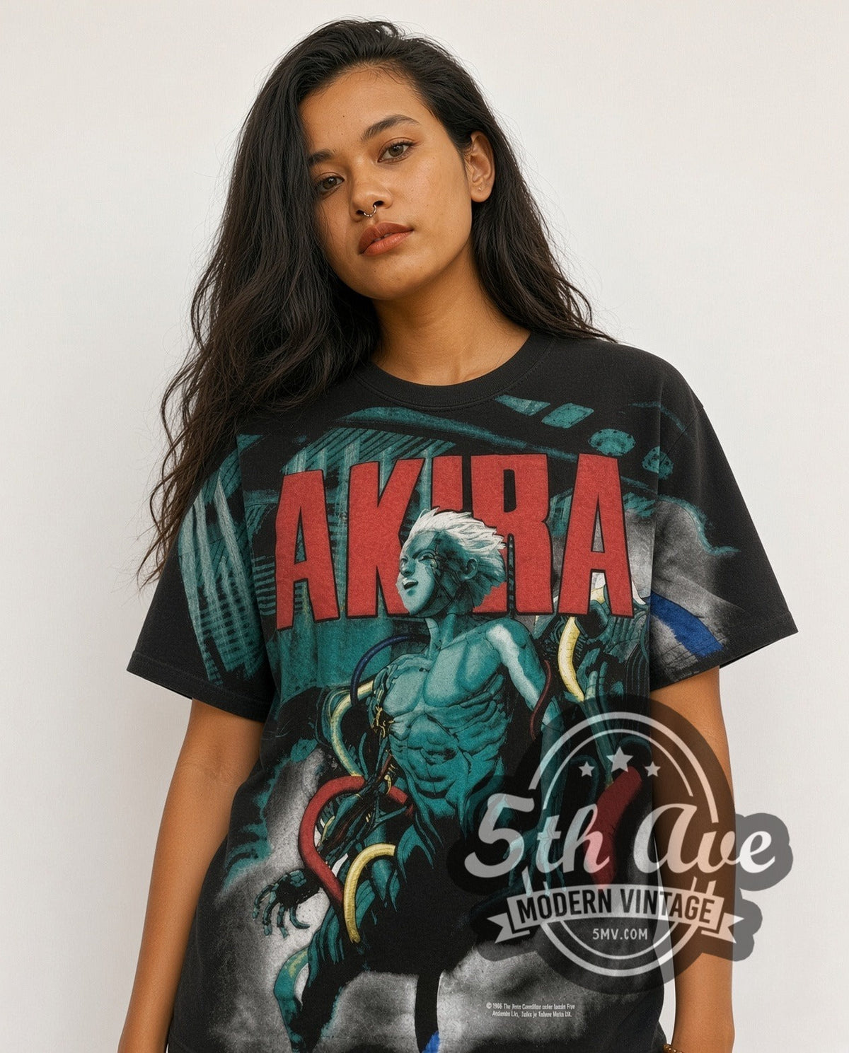 Model wearing the Akira Teal Character all-over-print vintage anime tee in black