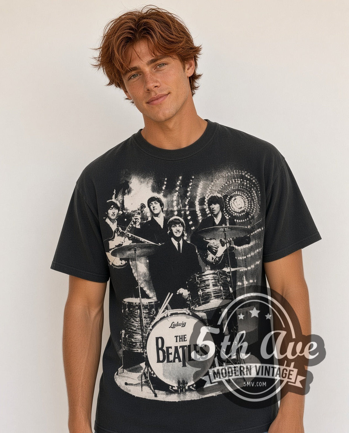 Model wearing The Beatles Photo Collage Drums all-over-print vintage band t-shirt in black