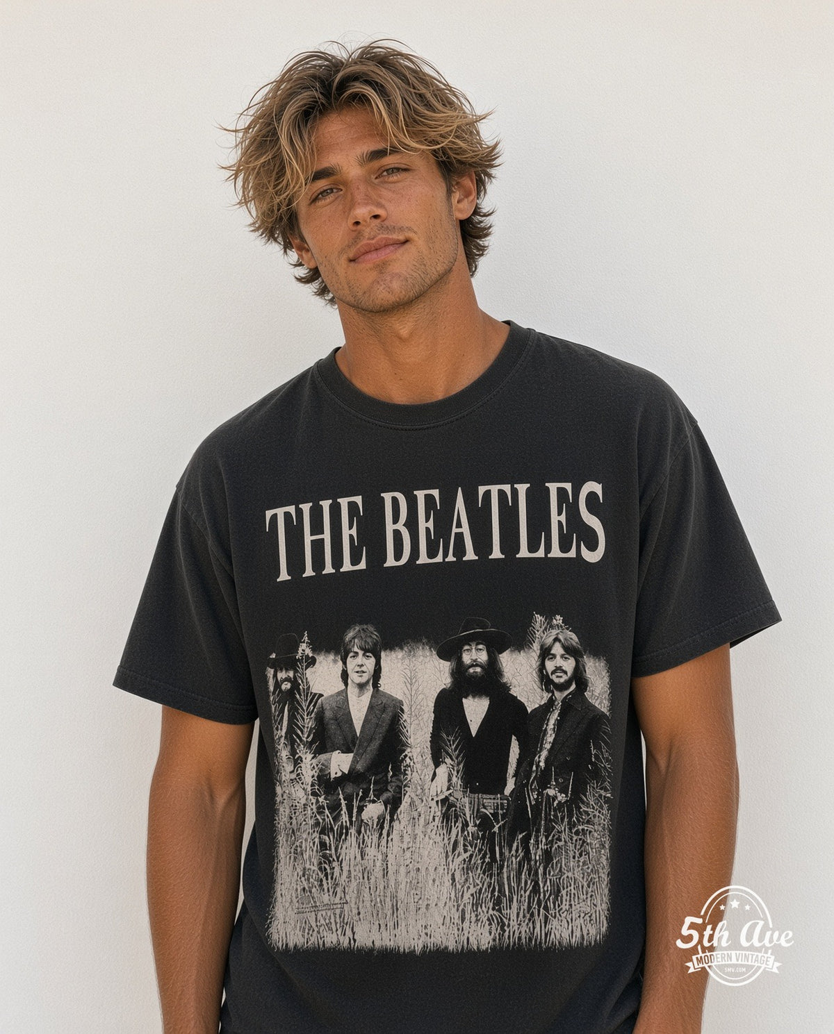 Model wearing The Beatles Field Photo black vintage band tee